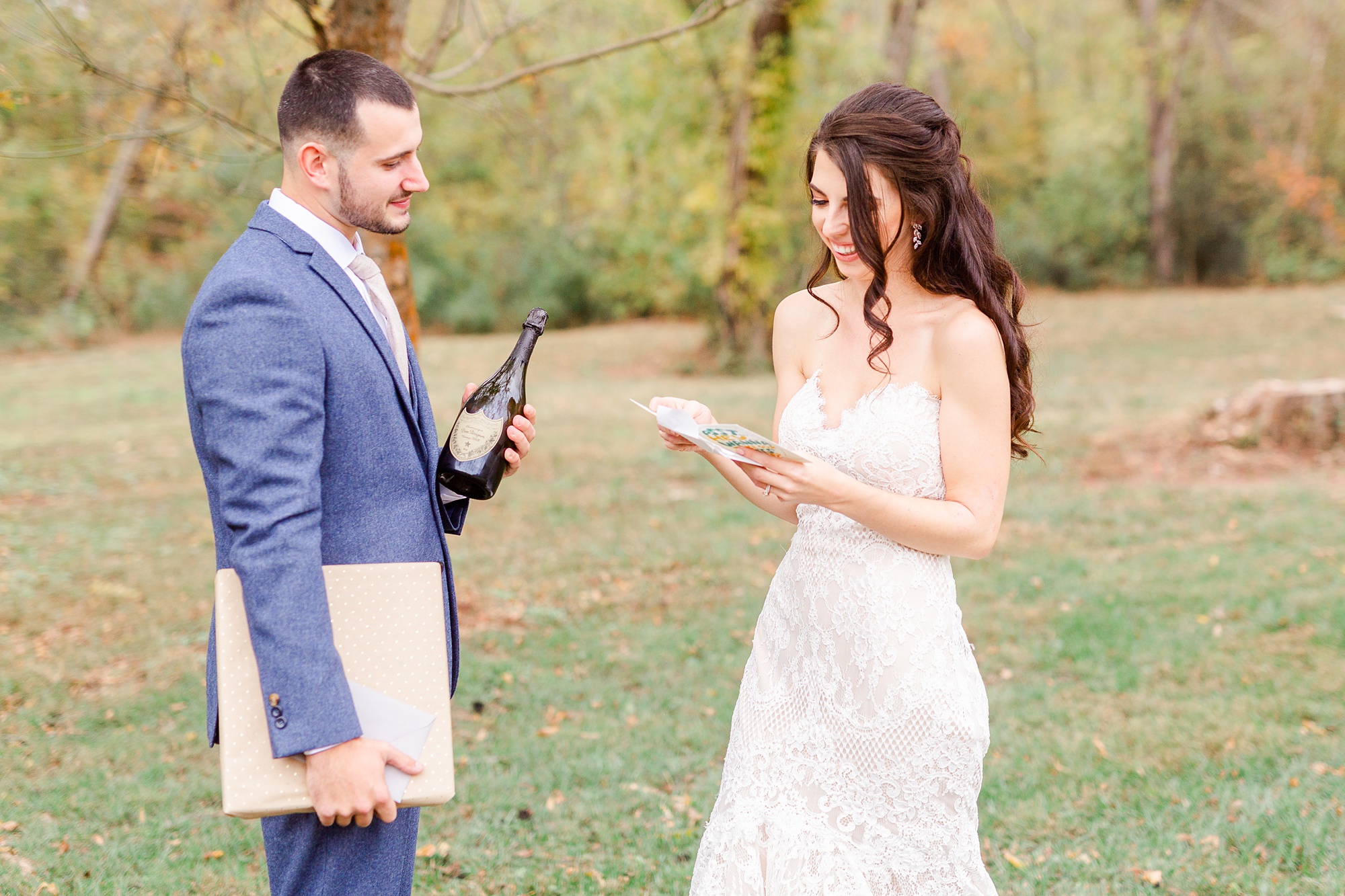 bride and groom exchange gifts during first look