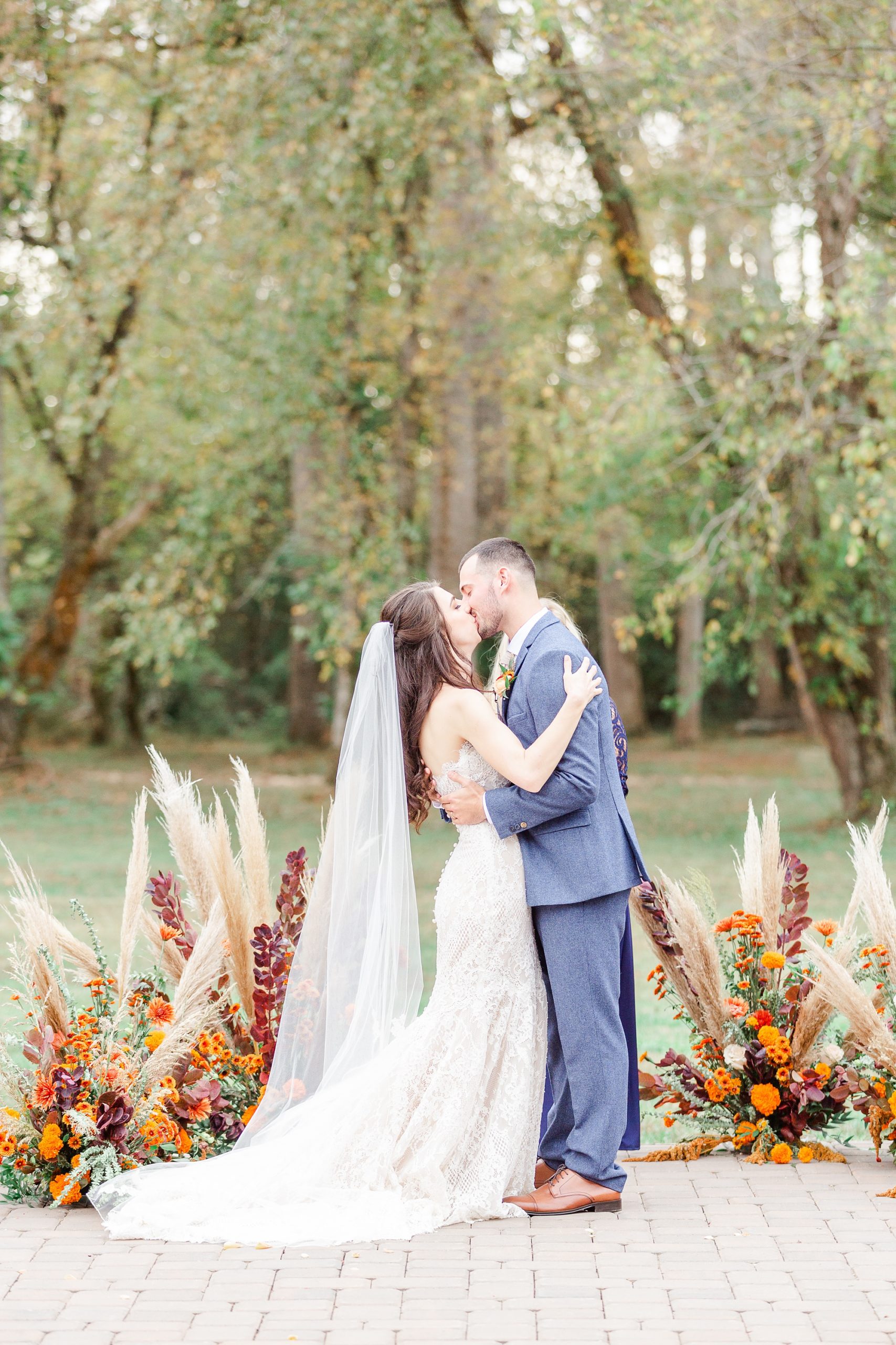bride and groom kiss after Providence Cotton Mil Providence Cotton Mill ceremony