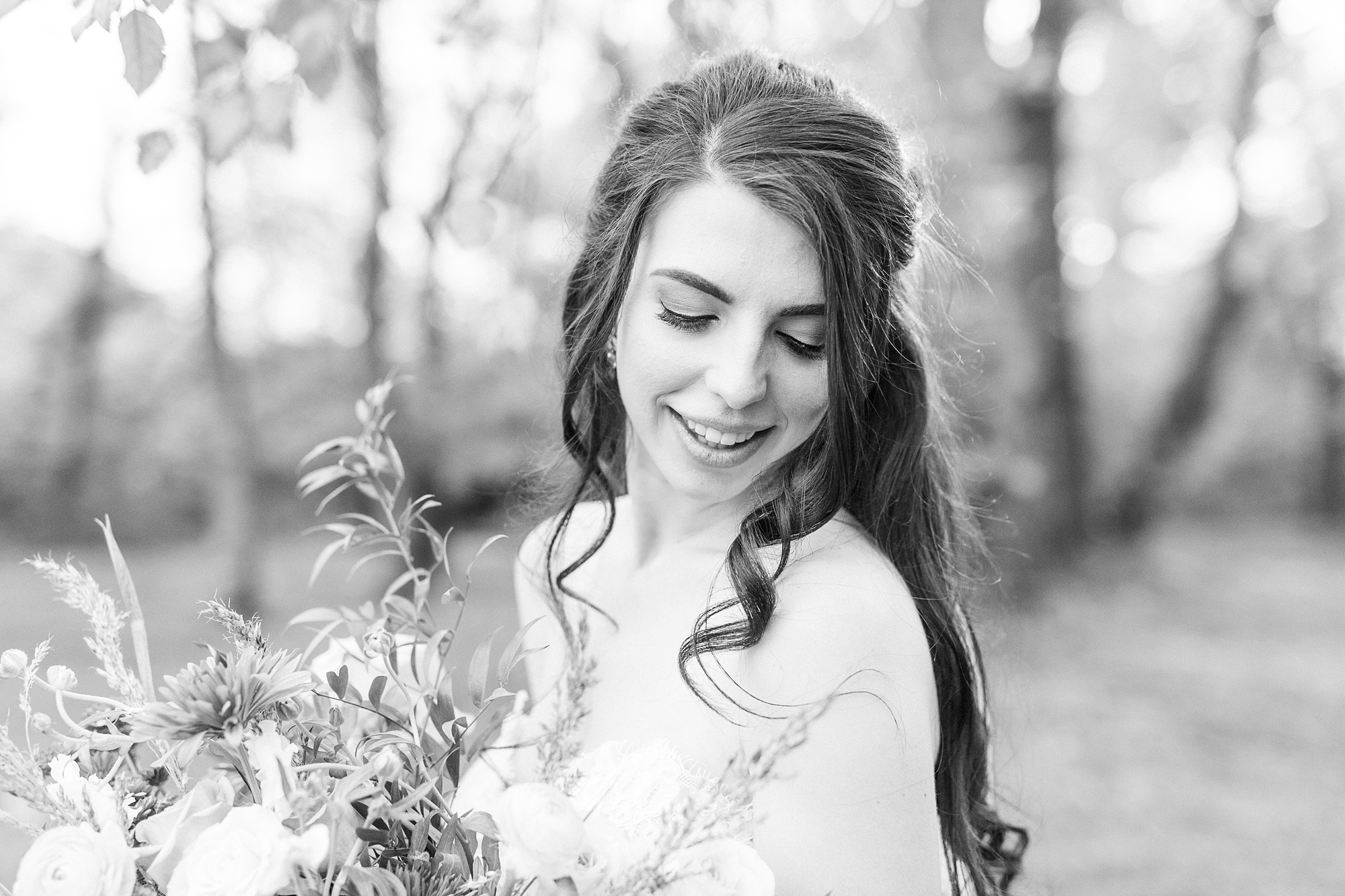 bride with classic makeup looks over shoulder