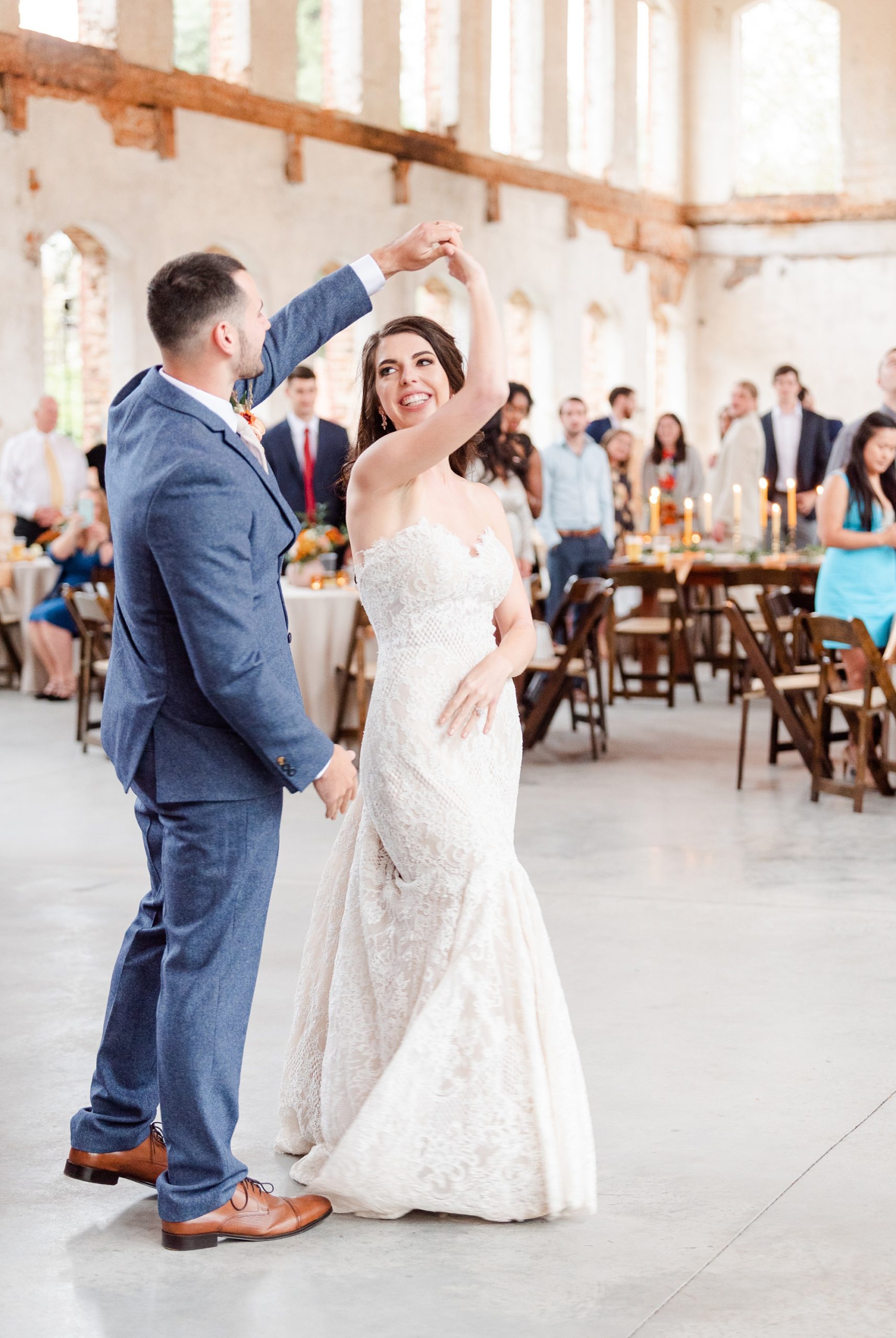 bride and groom's first dance at Providence Cotton Mill wedding reception