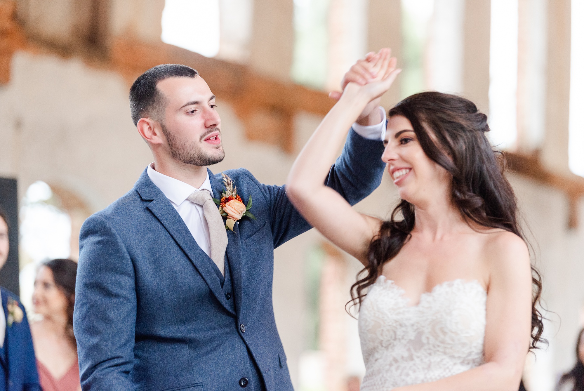 bride and groom's first dance at Providence Cotton Mill wedding reception