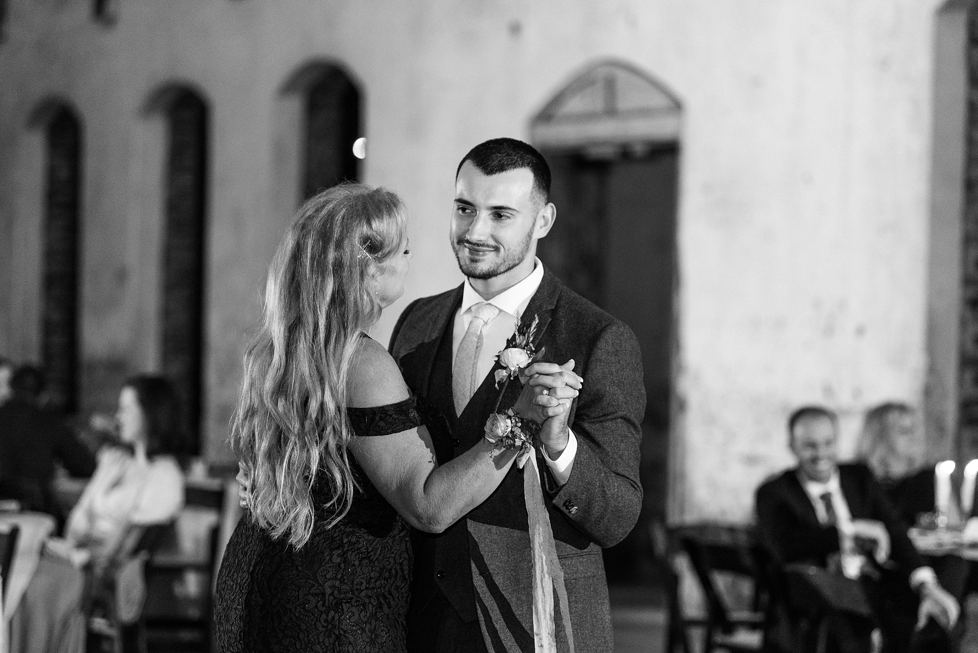 groom and mom dance during NC wedding reception