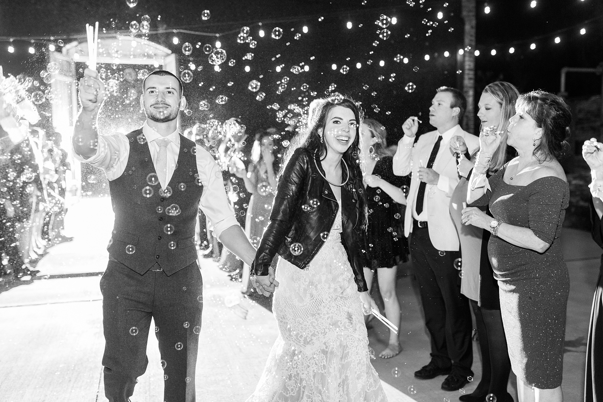 bubble exit from Providence Cotton Mill with bride in custom leather jacket