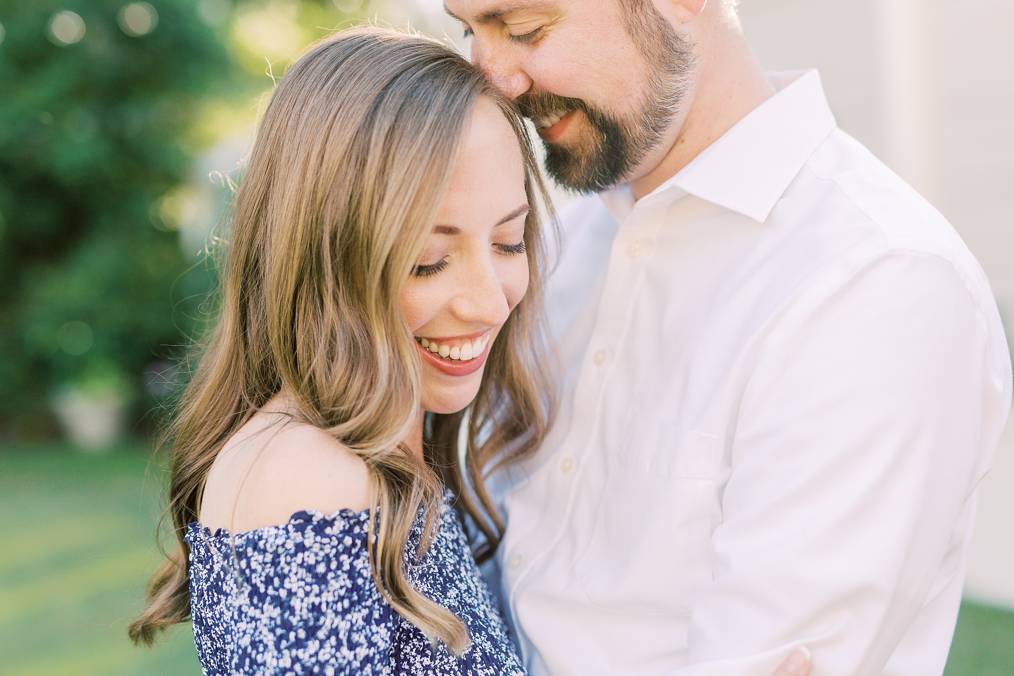 groom nuzzles bride's forehead during Separk Mansion engagement session