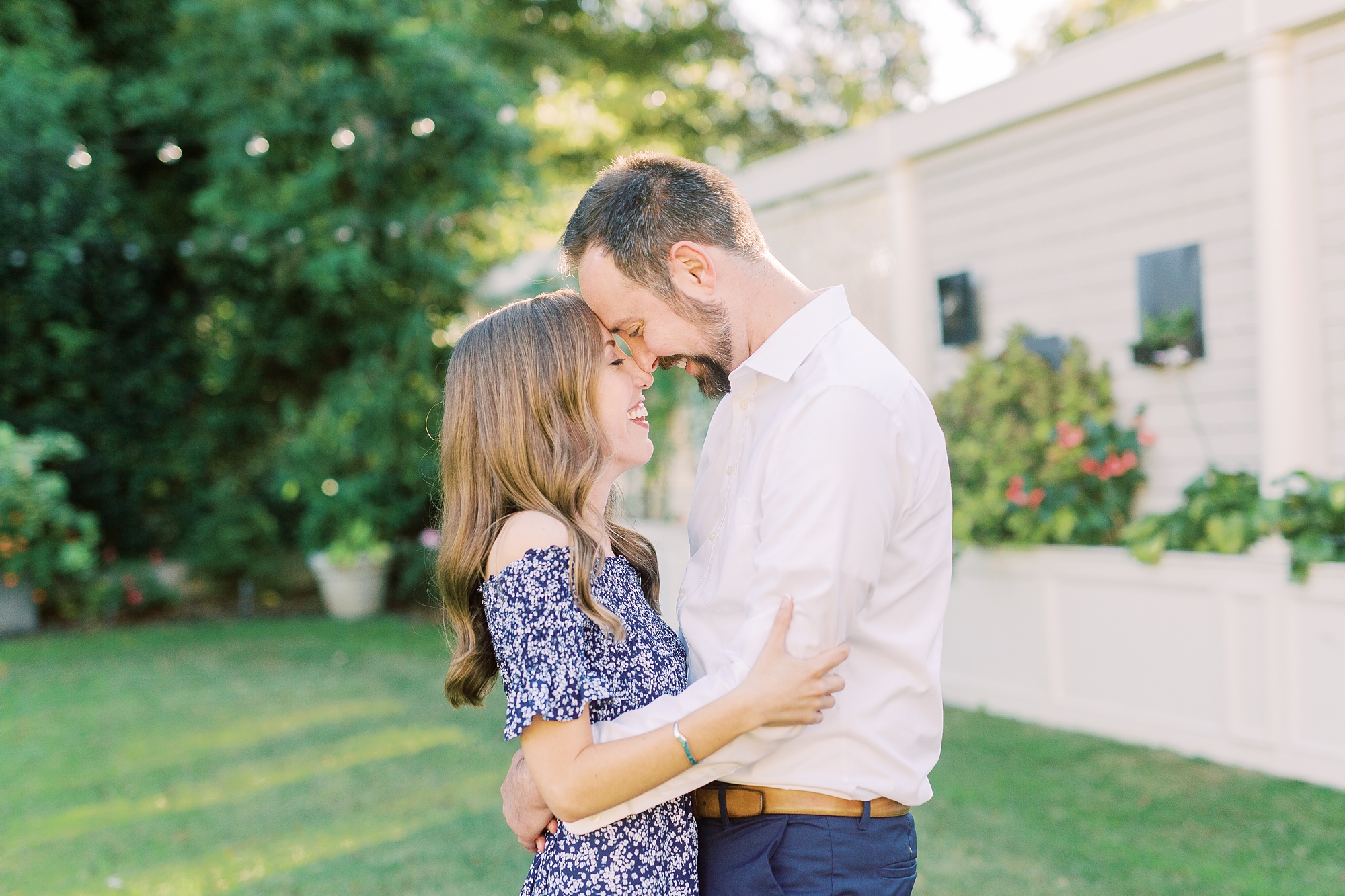 bride and groom stand nose to nose during Separk Mansion engagement session