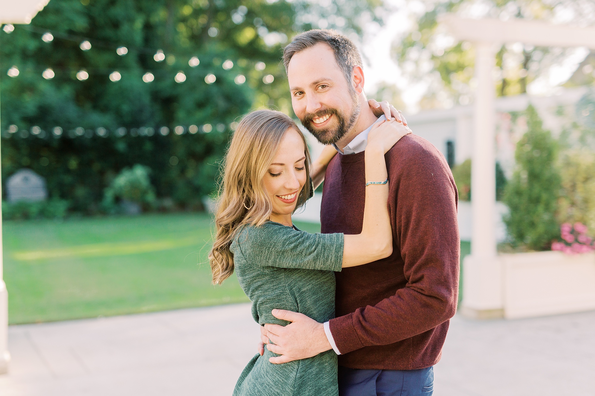 fall engagement session under string lights