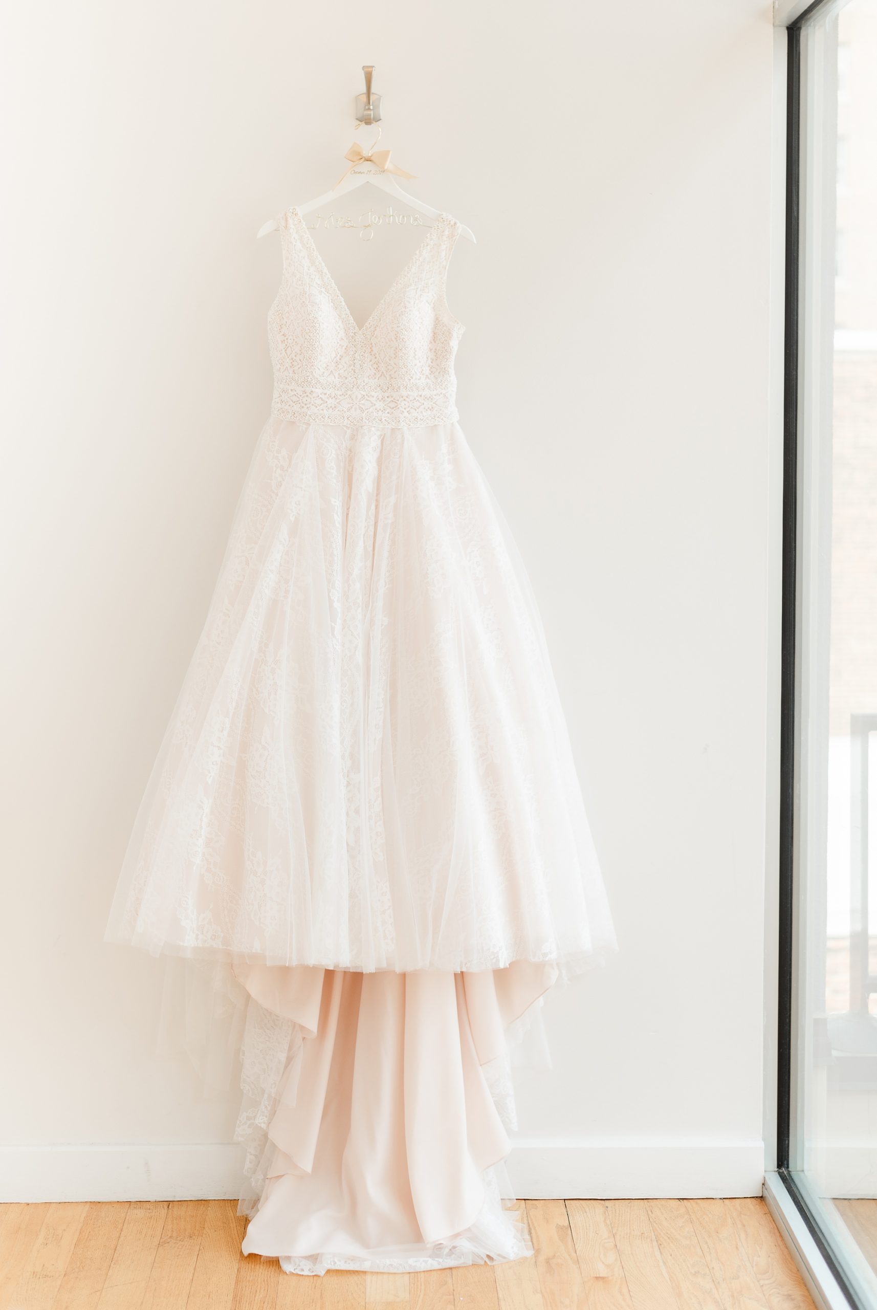wedding dress hangs at Stockroom at 230