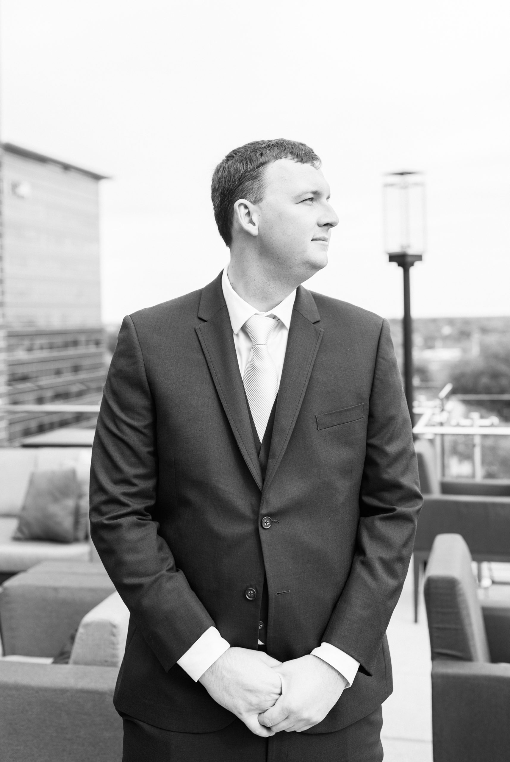 groom's portrait on rooftop at Stockroom at 230