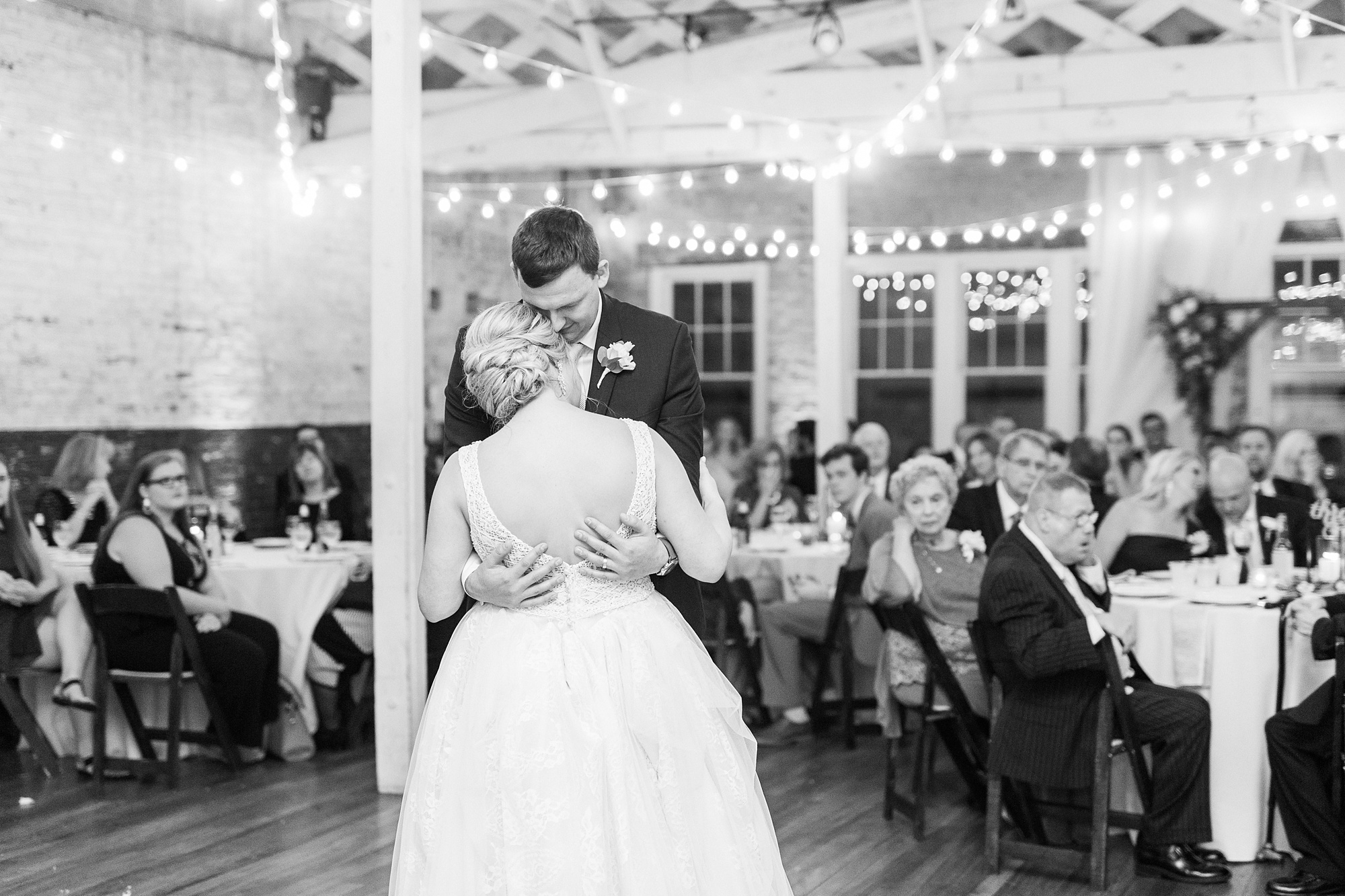 bride and groom dance during Raleigh NC wedding reception