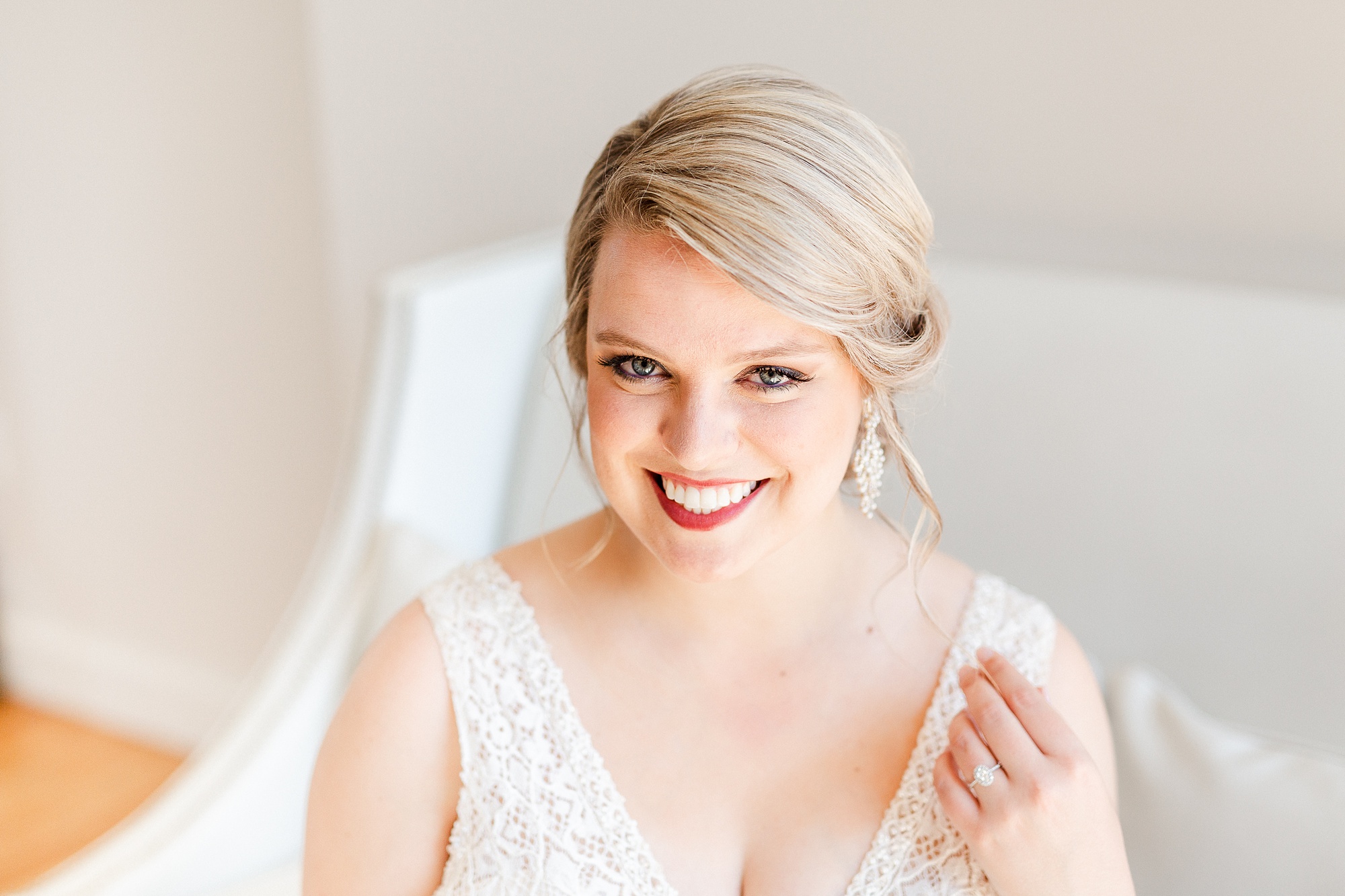 bride smiles during bridal photos at The Glass Box