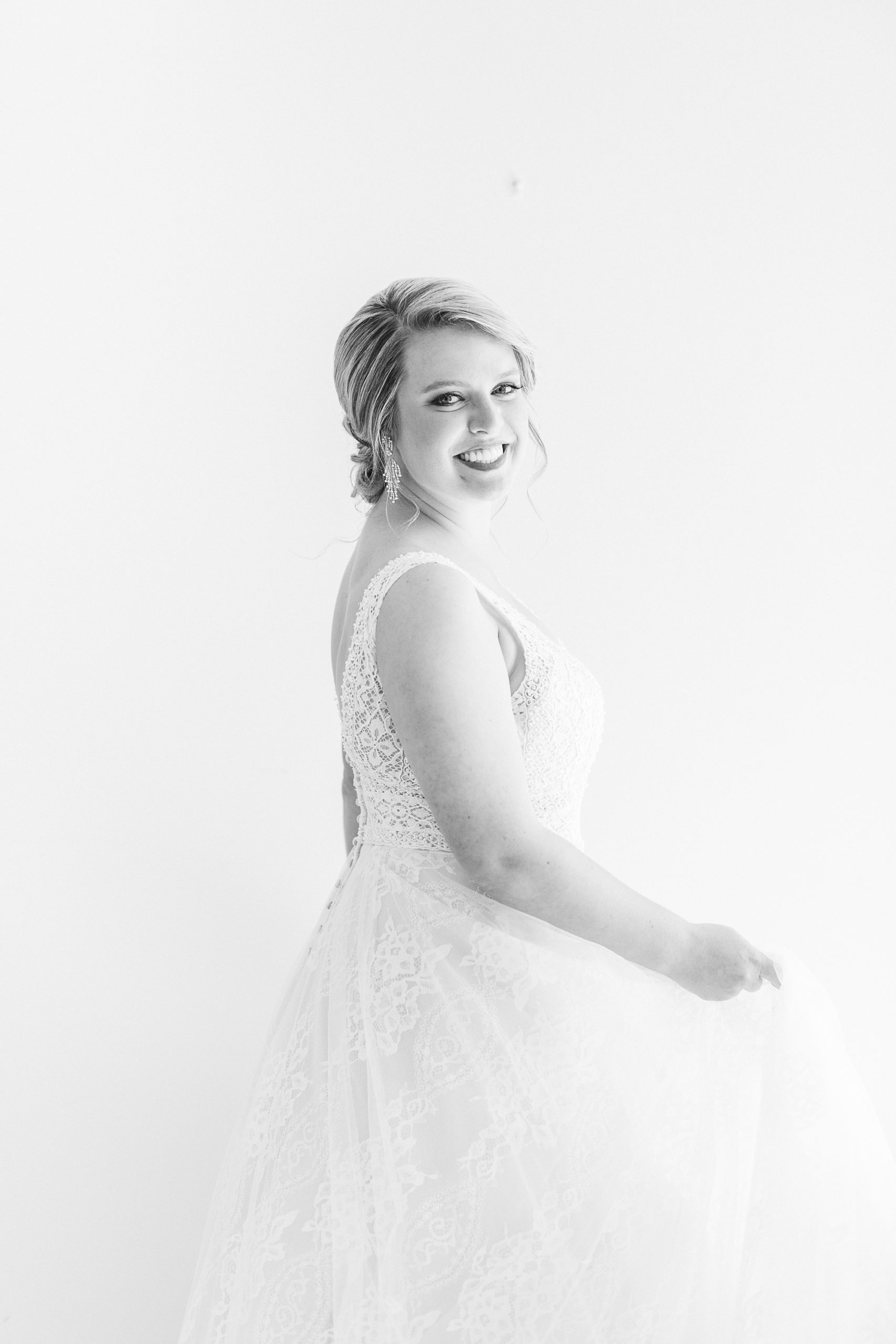 bride twirls wedding gown in Raleigh NC