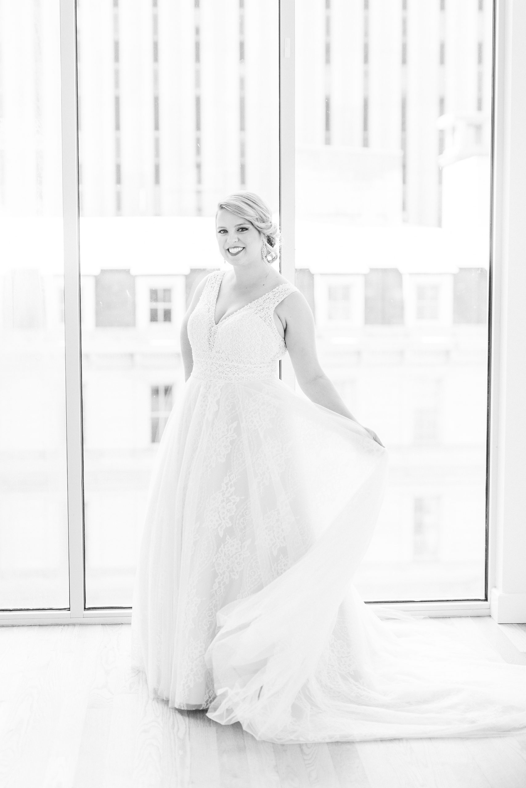 bride twirls wedding dress in Raleigh NC