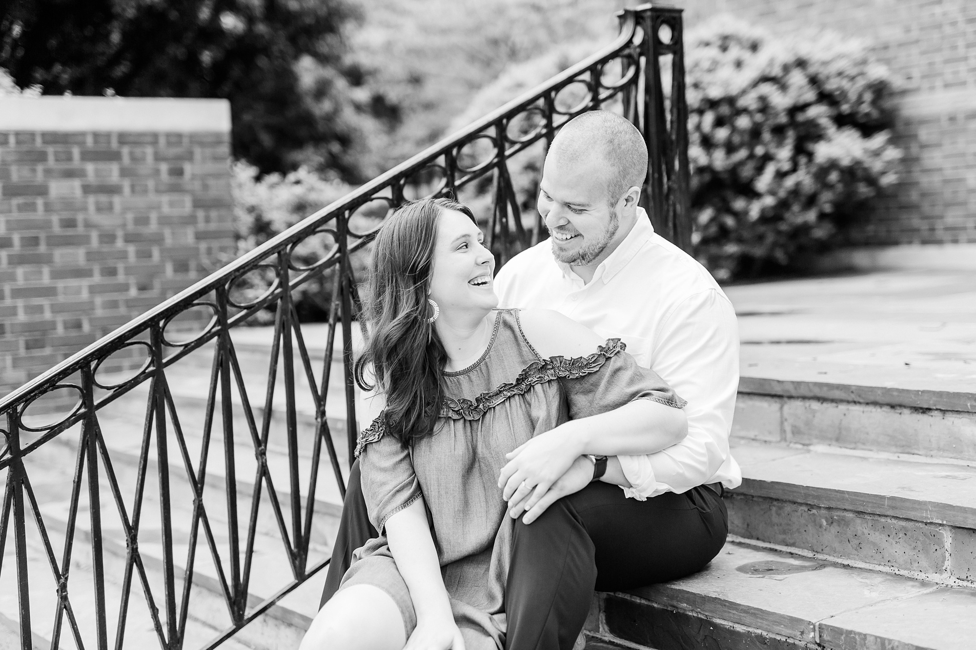 bride laughs during Downtown Davidson engagement session