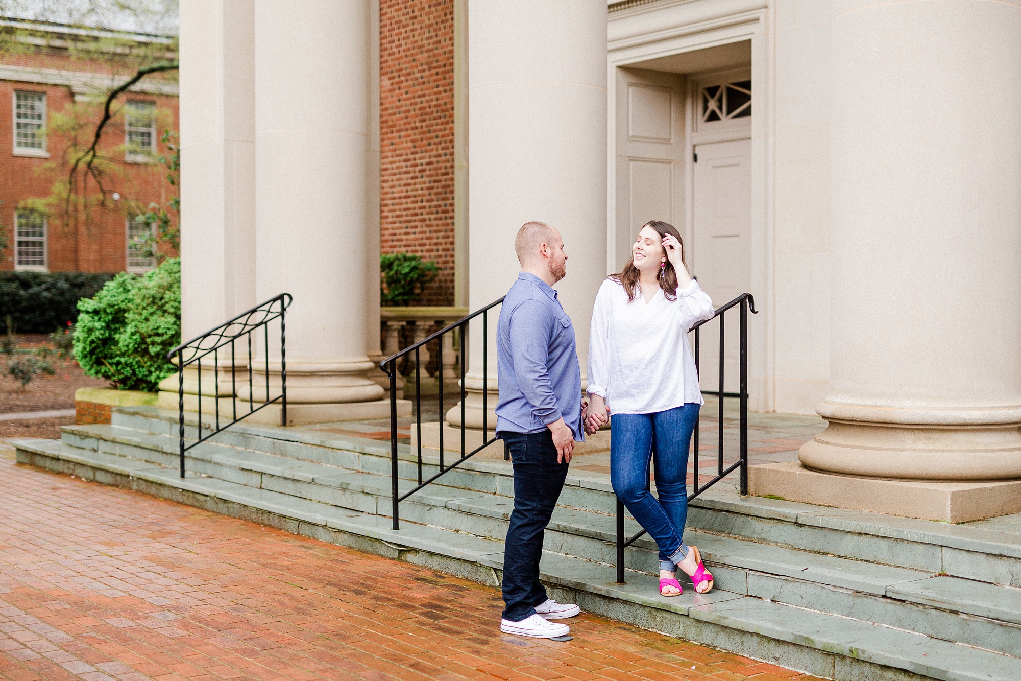 bride and groom walk on steps in Downtown Davidson
