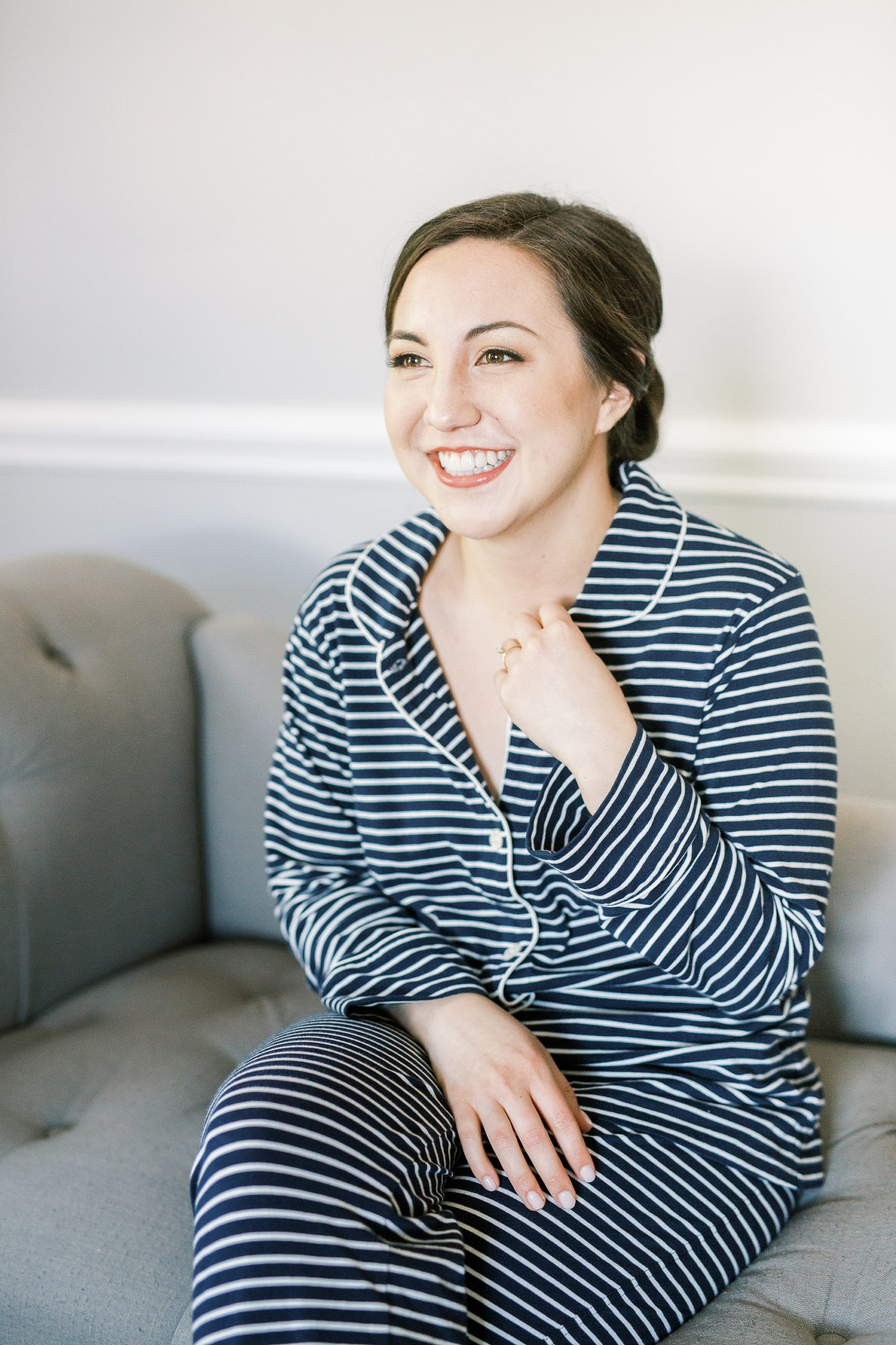bride in striped PJs from J Crew on wedding morning