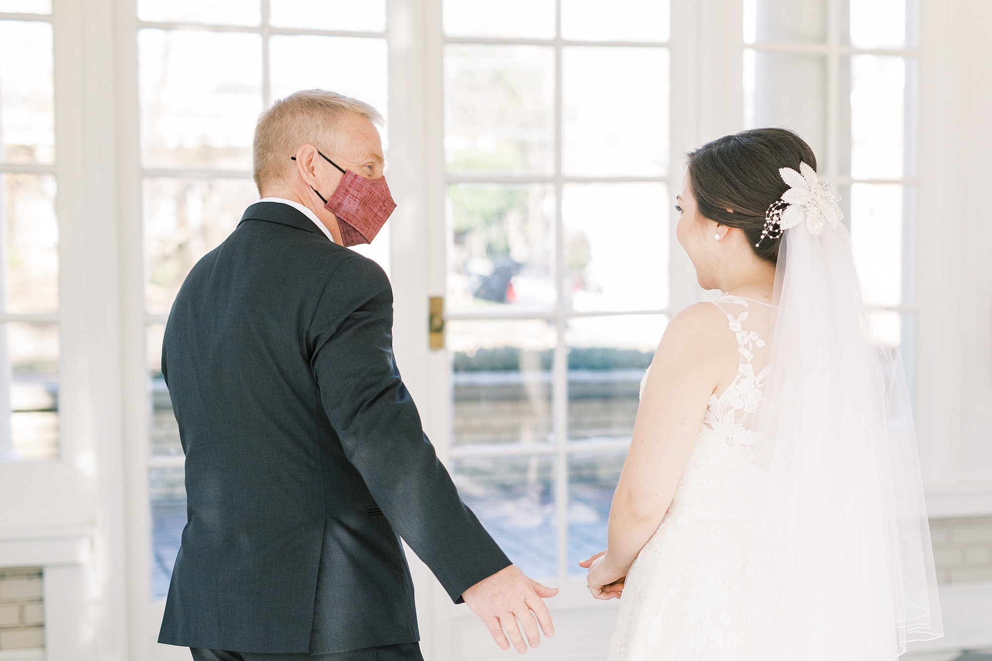 bride and dad have first look in Separk Mansion