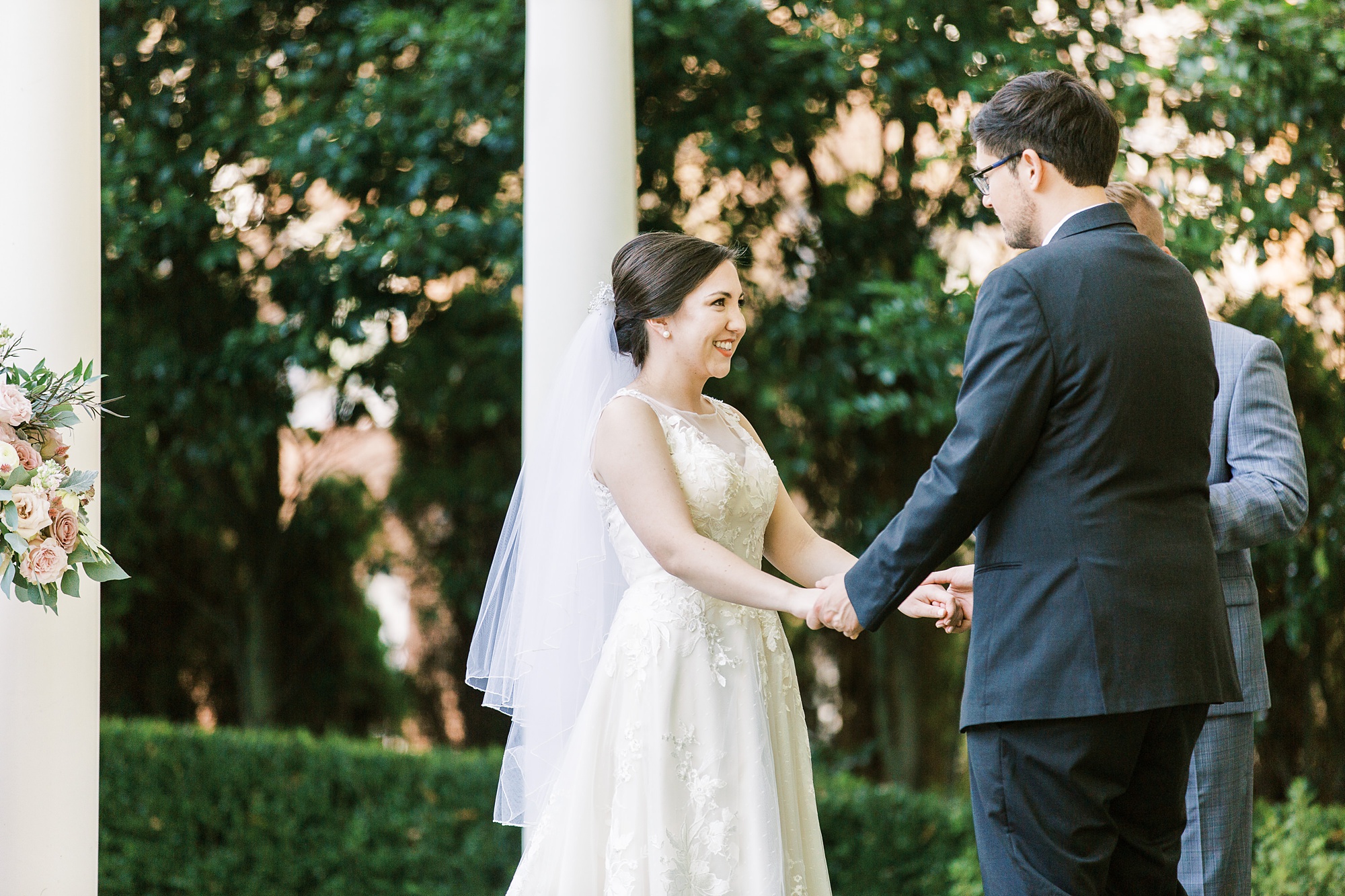 bride smiles during ceremony at Separk Mansion