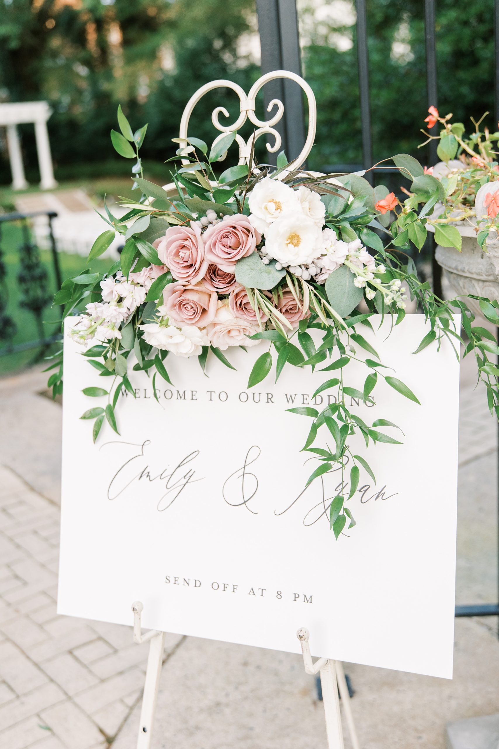 mauve floral welcome sign for Separk Mansion reception