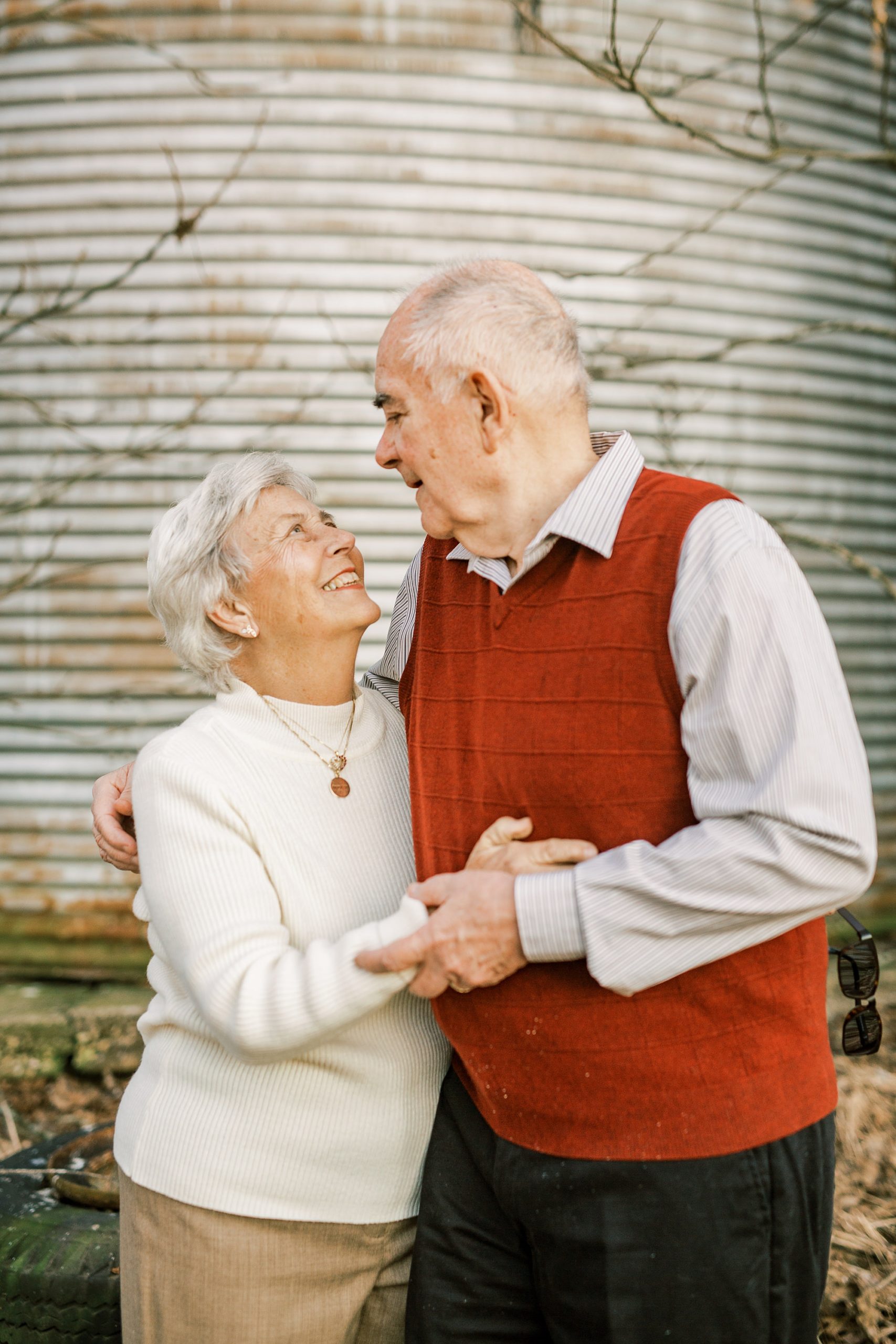 50th anniversary photos on family farm by silo
