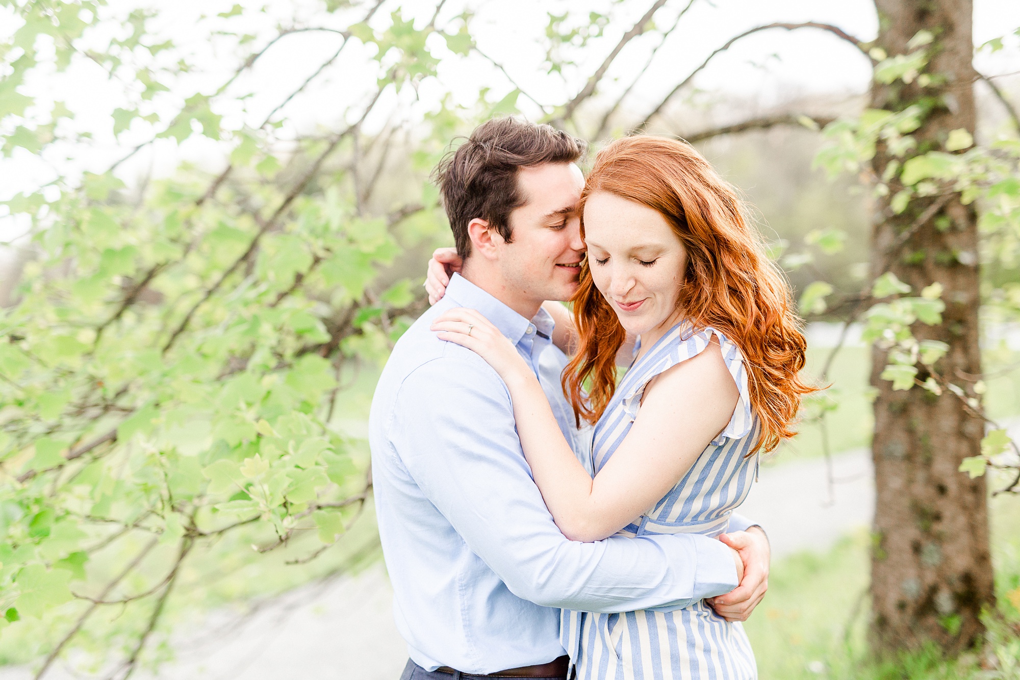 groom nuzzles bride's forehead during Moses Cone Manor engagement photos
