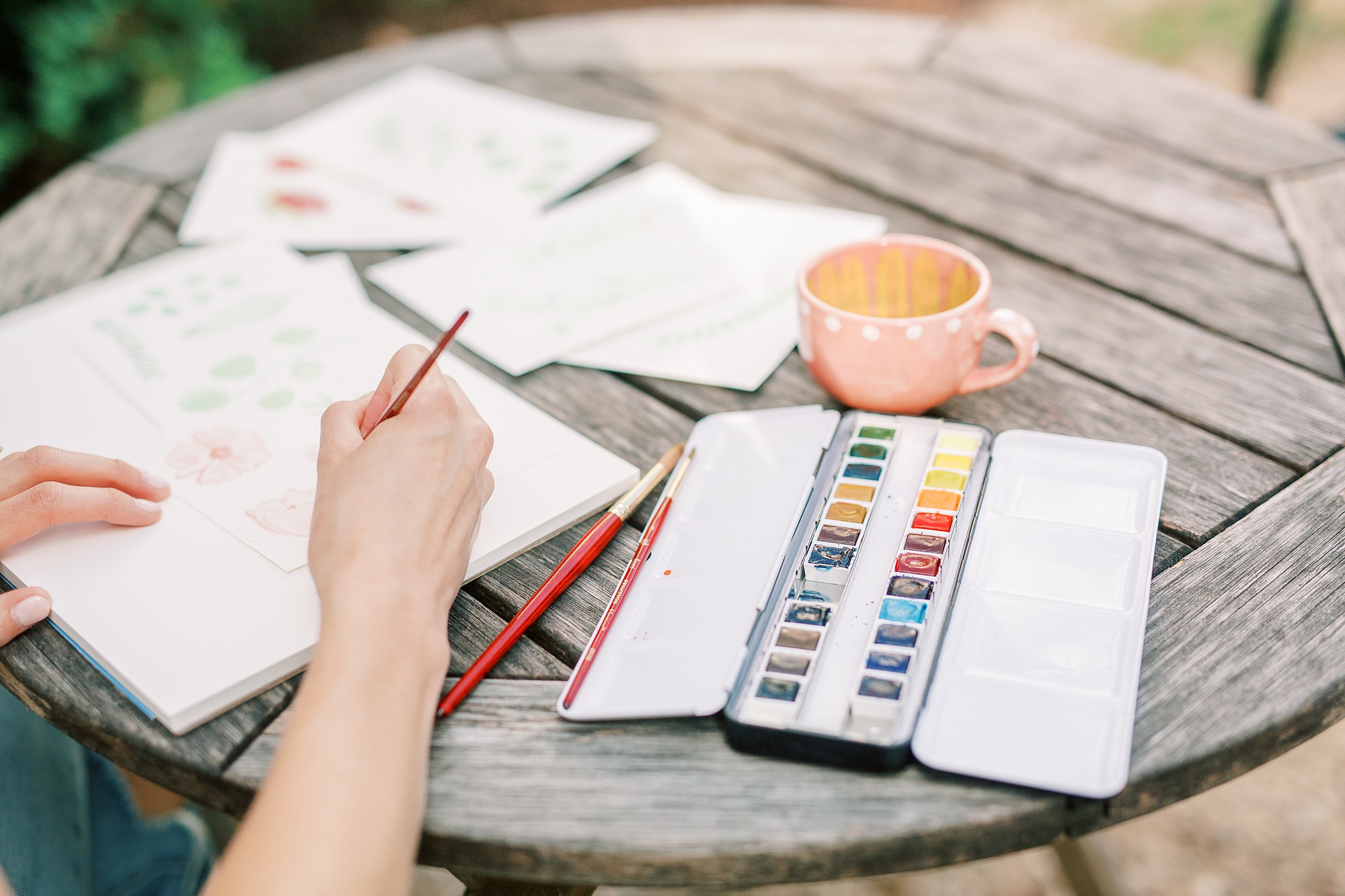 watercolors out during branding photos with artist in CLT