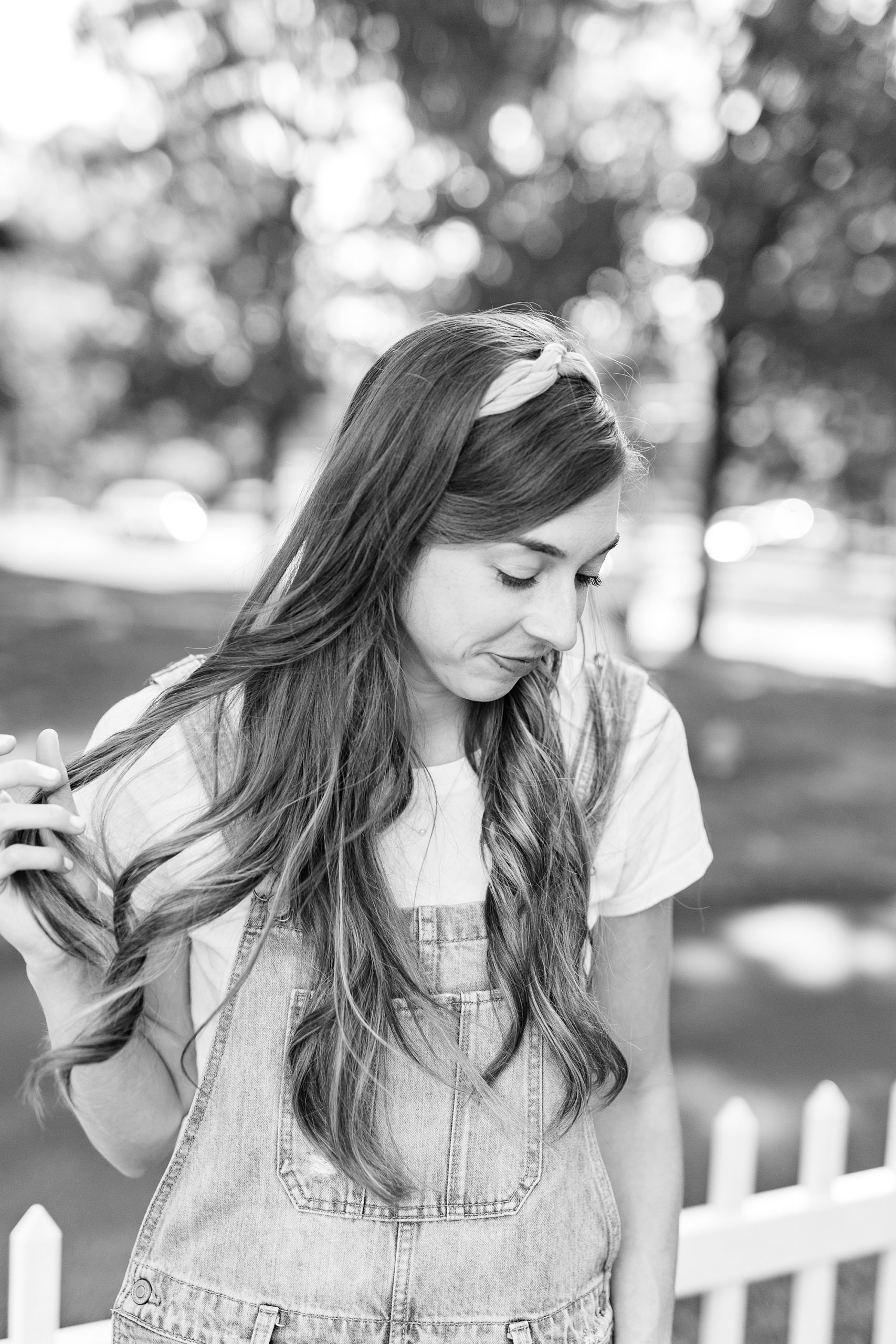 artist looks over shoulder in Charlotte garden