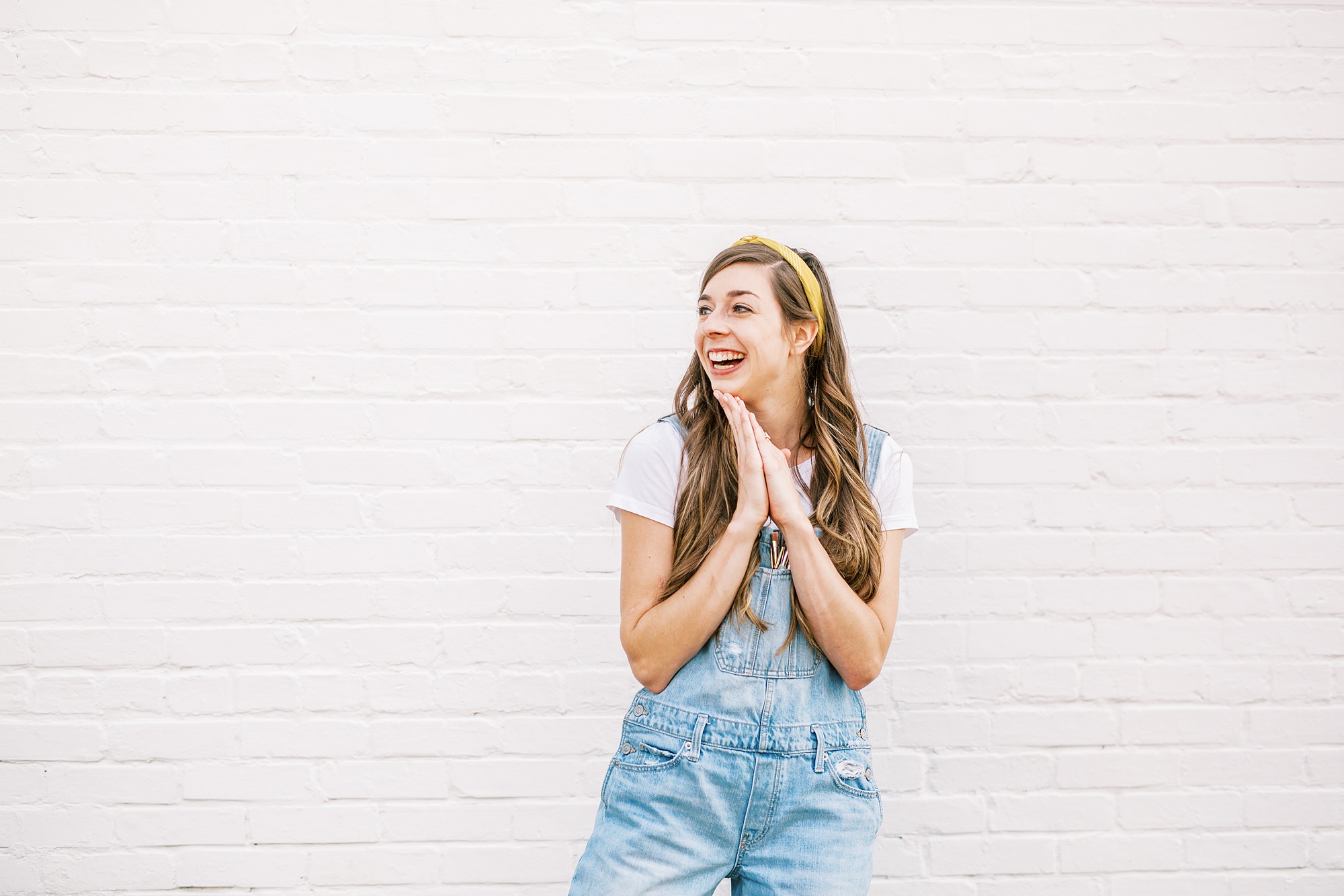 business owner laughs during branding photos in Charlotte NC
