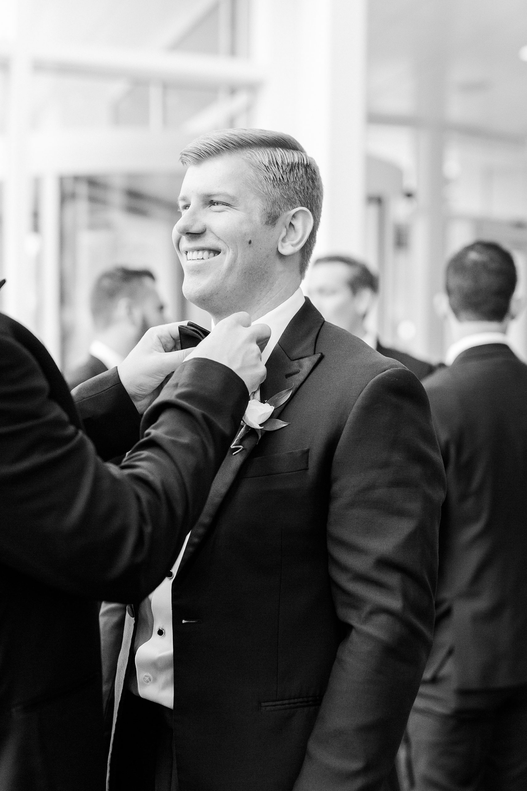 groom prepares for Byron's South End wedding