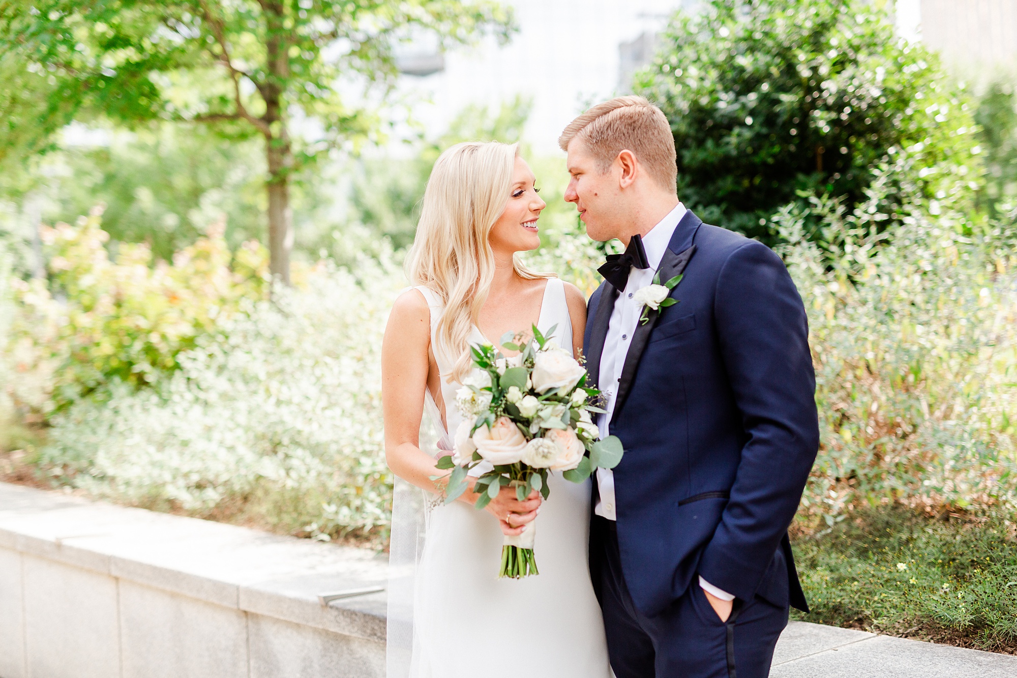 groom looks at bride at Romare Bearden Park