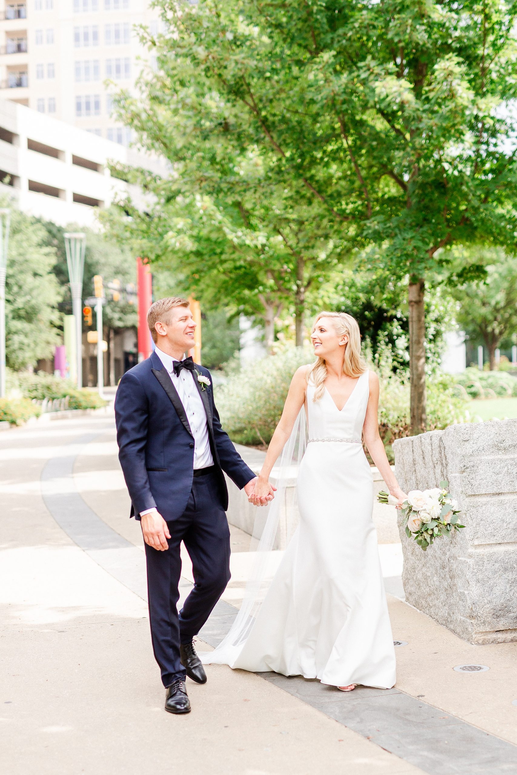 couple walks along path in Romare Bearden Park