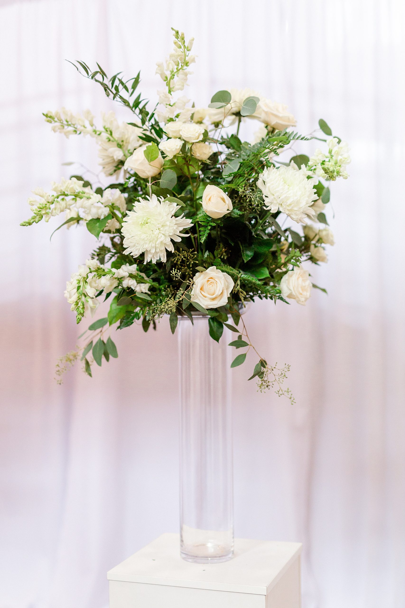 tall floral display with white flowers at Design Center Atrium