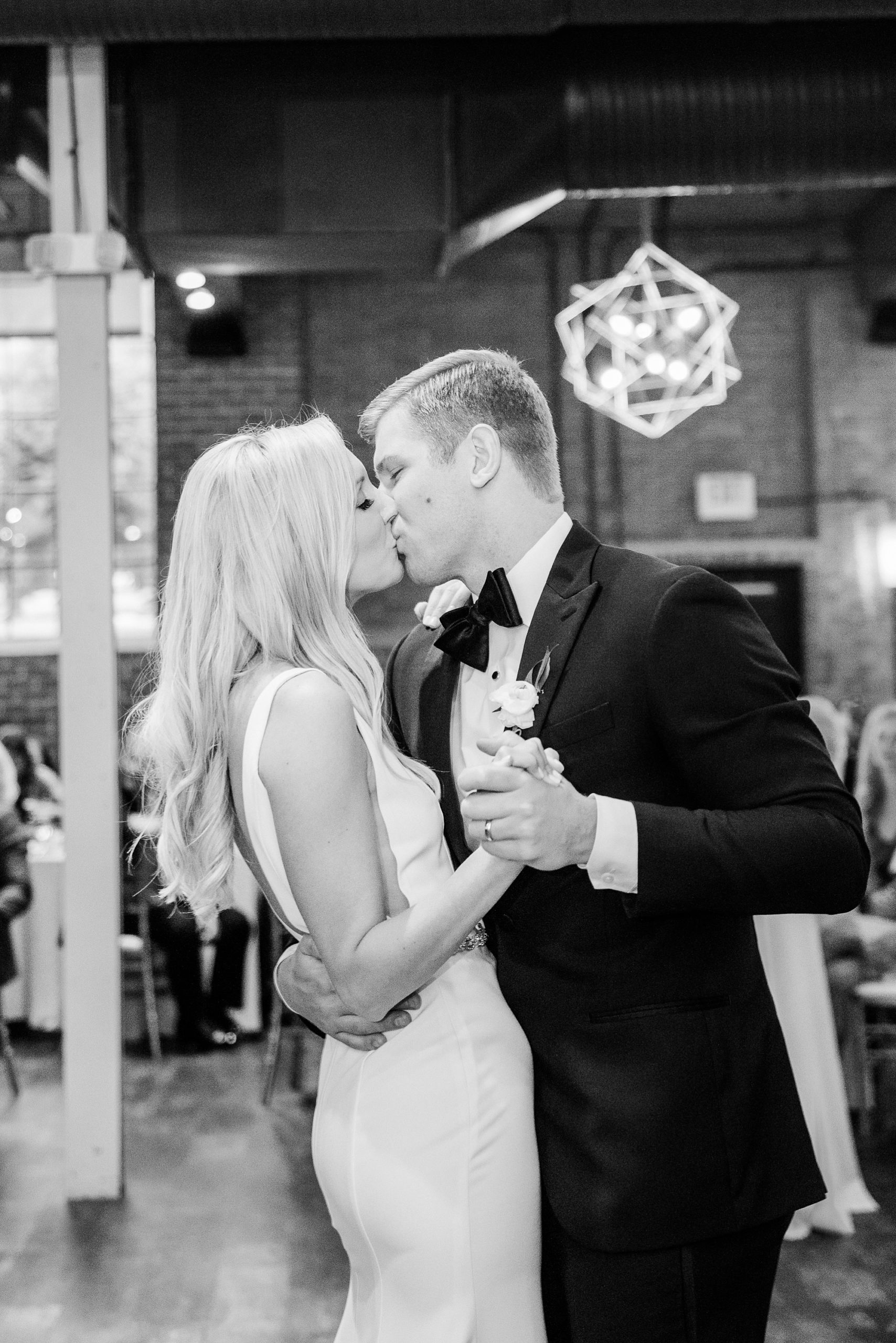 groom and bride kiss during first dance at Byron's South End