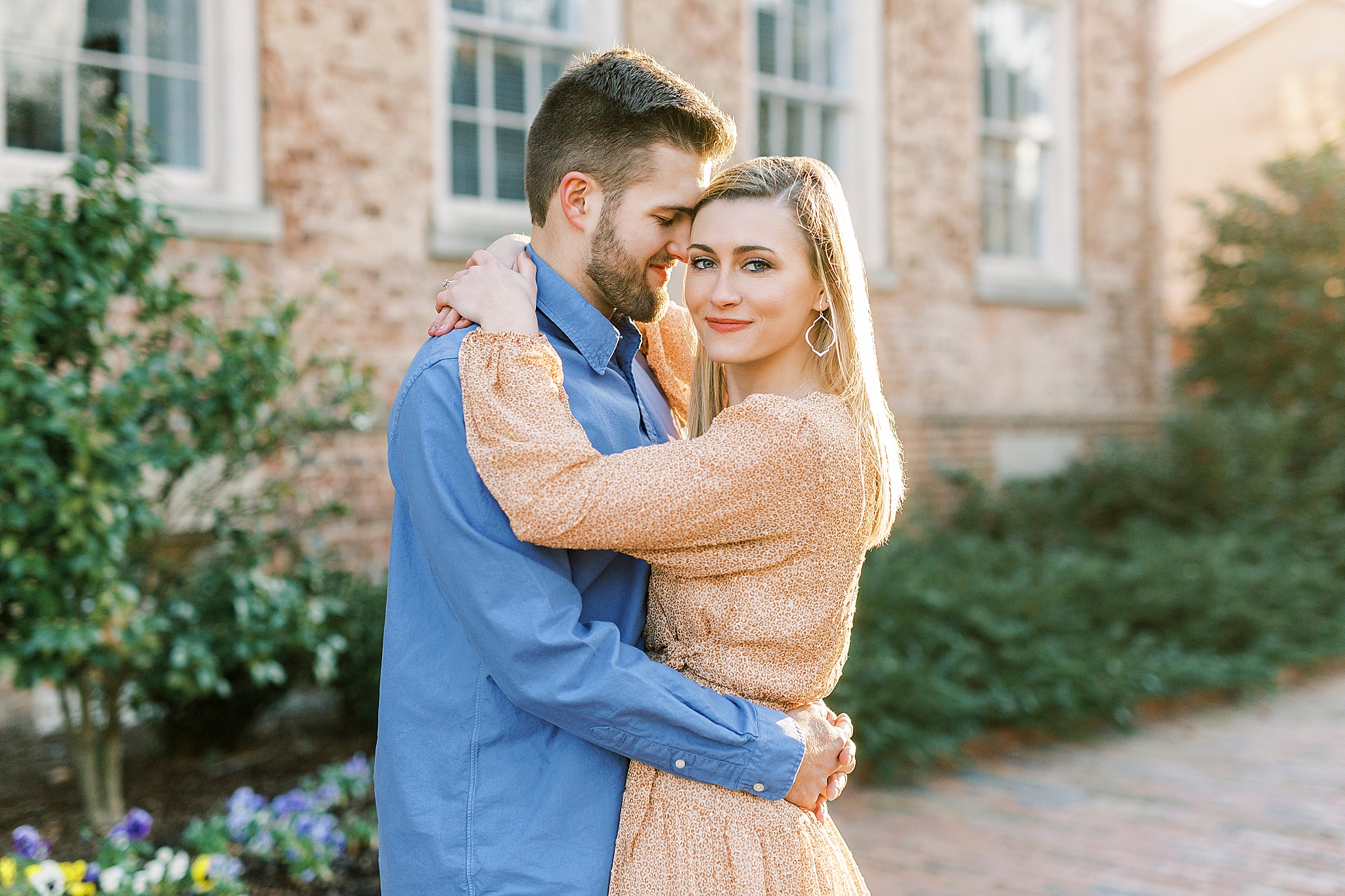 groom nuzzles bride's cheek during Chapel Hill engagement session