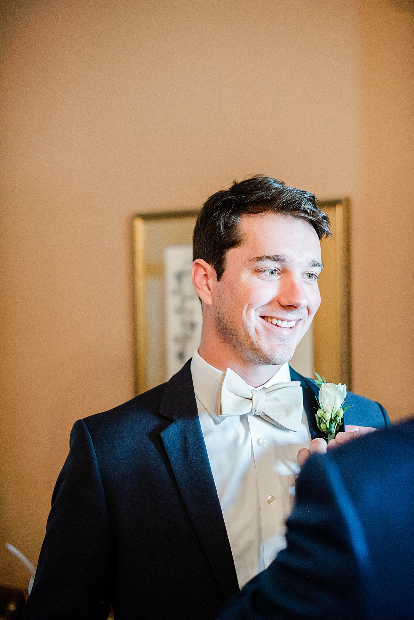 groom prepares for North Carolina wedding