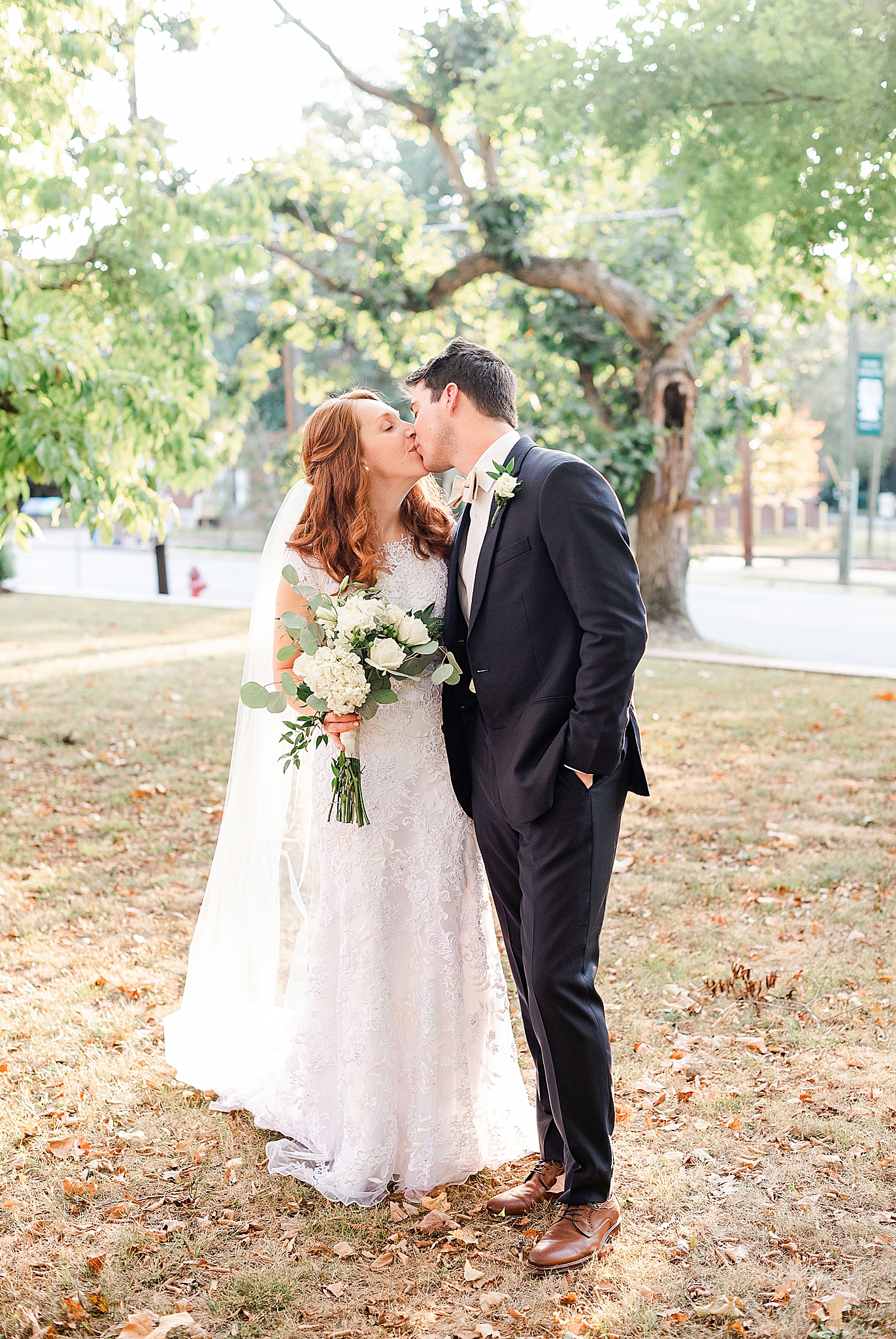 newlyweds kiss after wedding ceremony