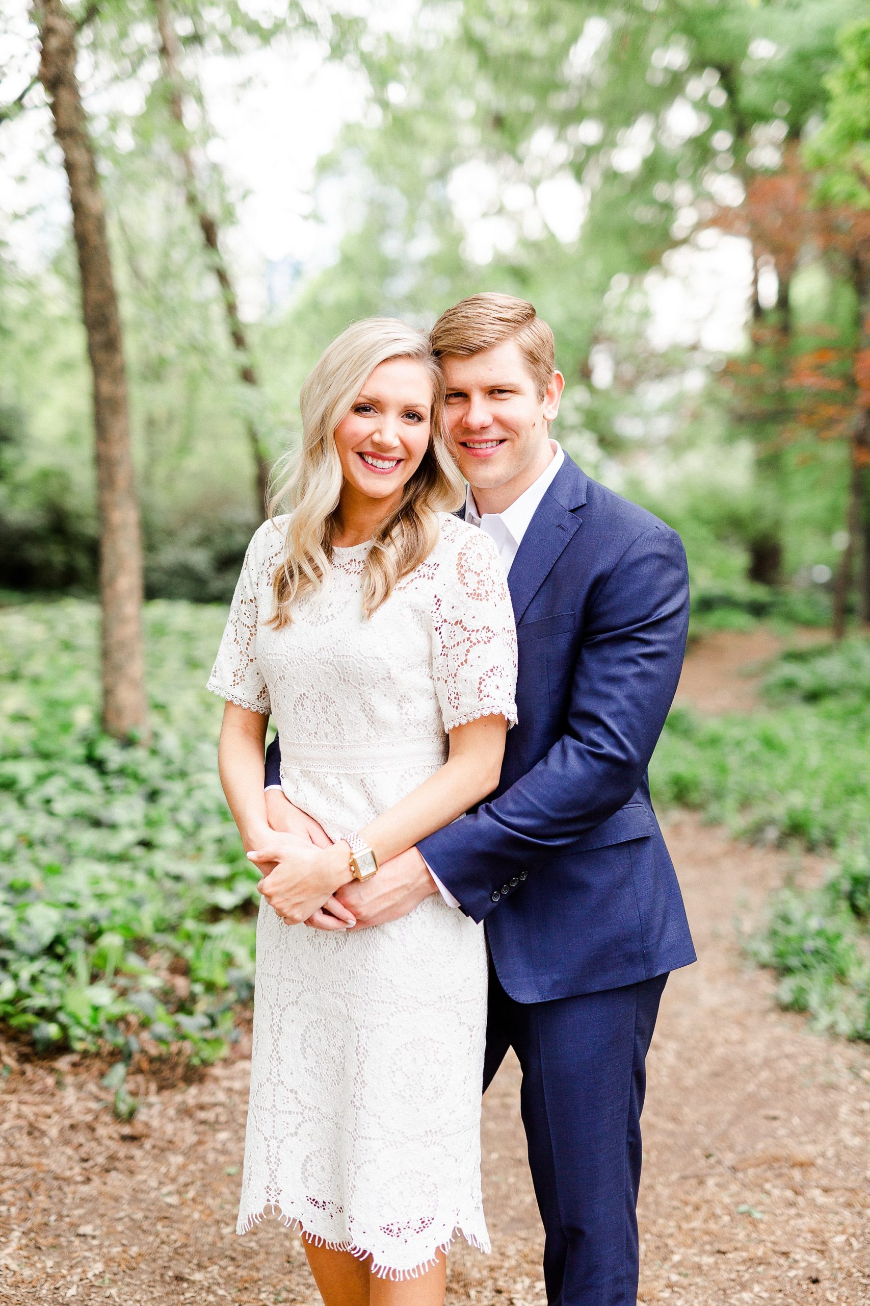 bride and groom hug during stylish Charlotte engagement photos