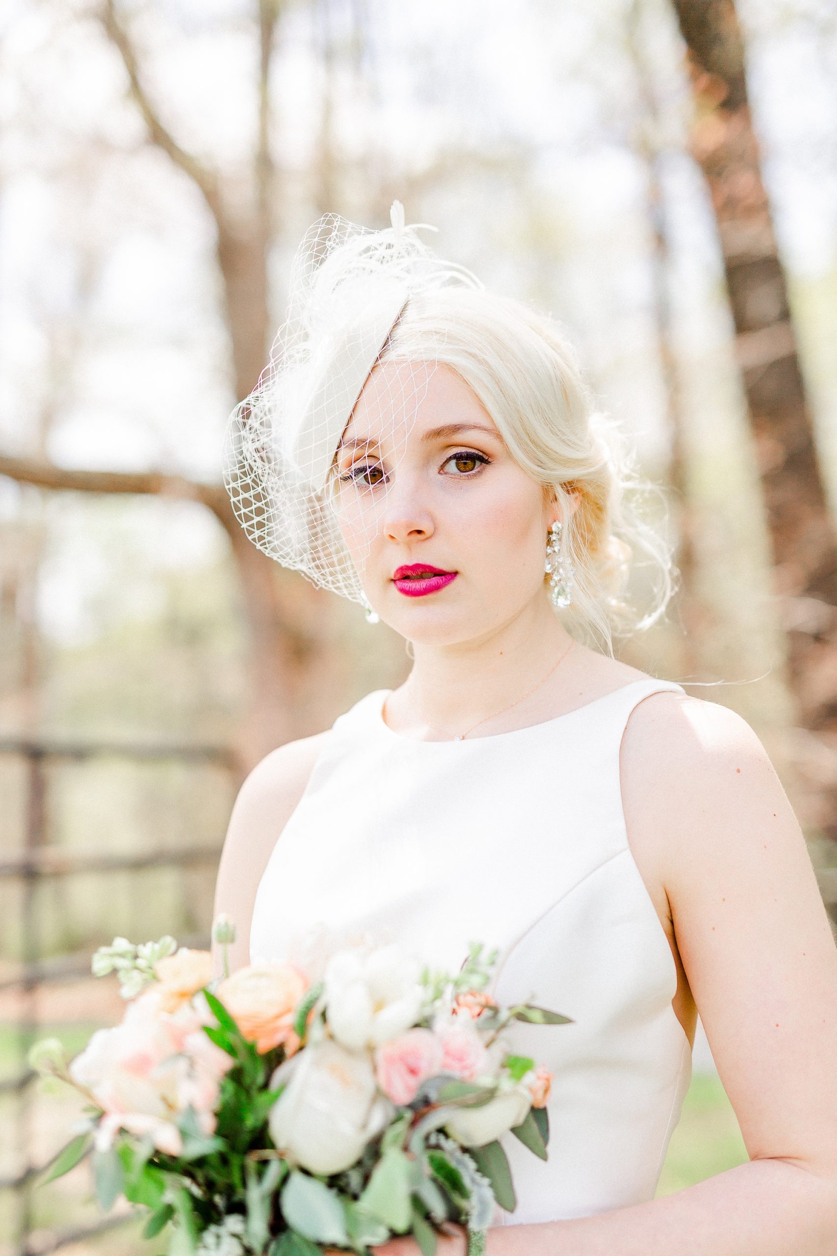 spring bridal portraits of bride with fascinator