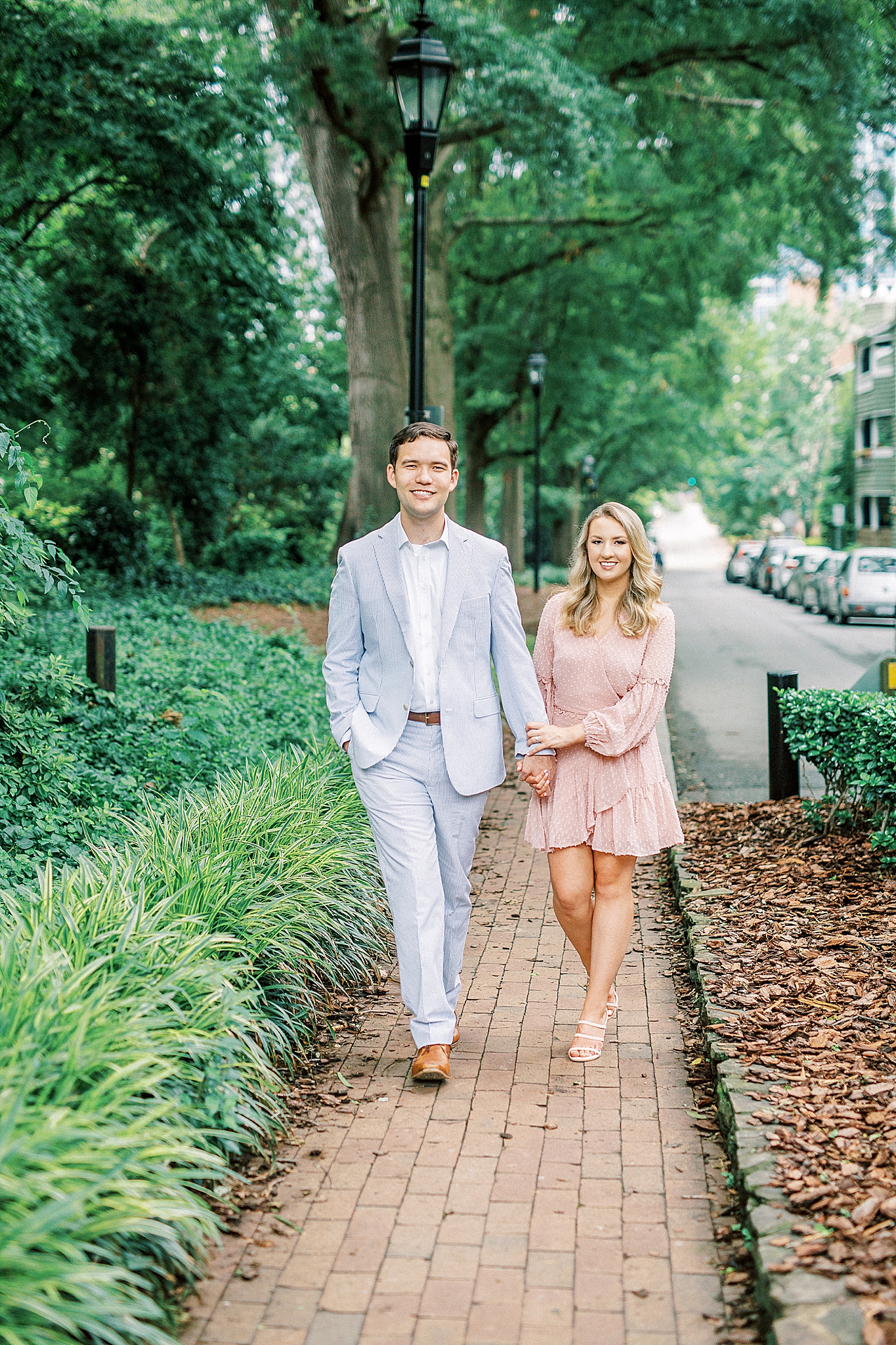 Couple walks along path at Fourth Ward Park