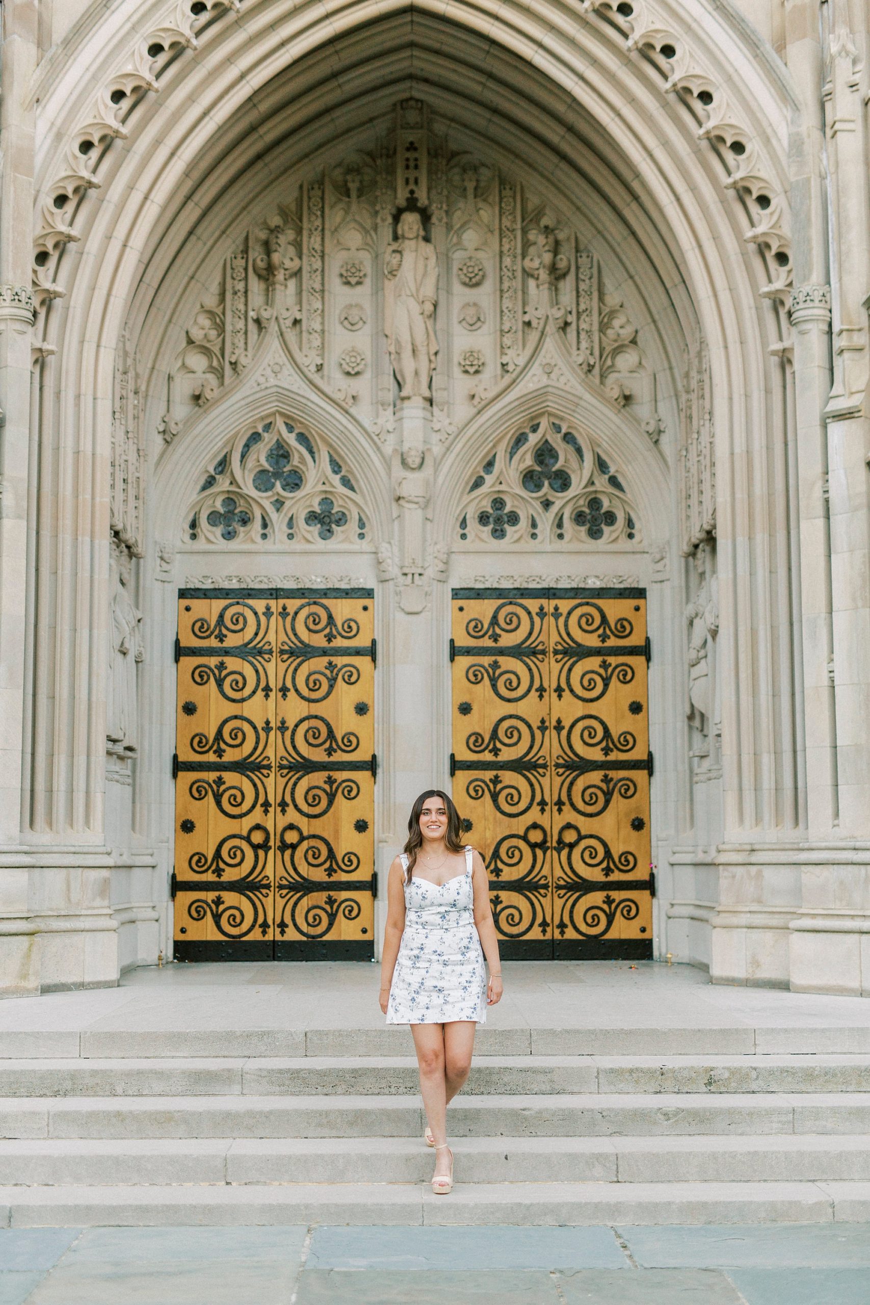 girl walks down steps at Duke Chapel in NC