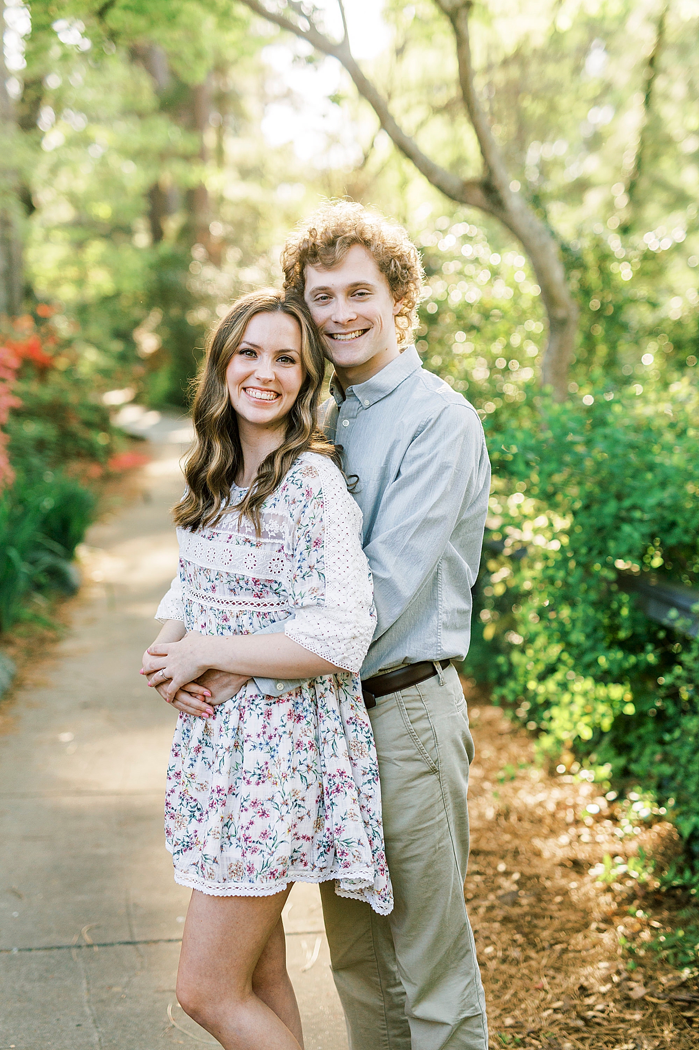 couple hugs during Glencairn Gardens engagement photos
