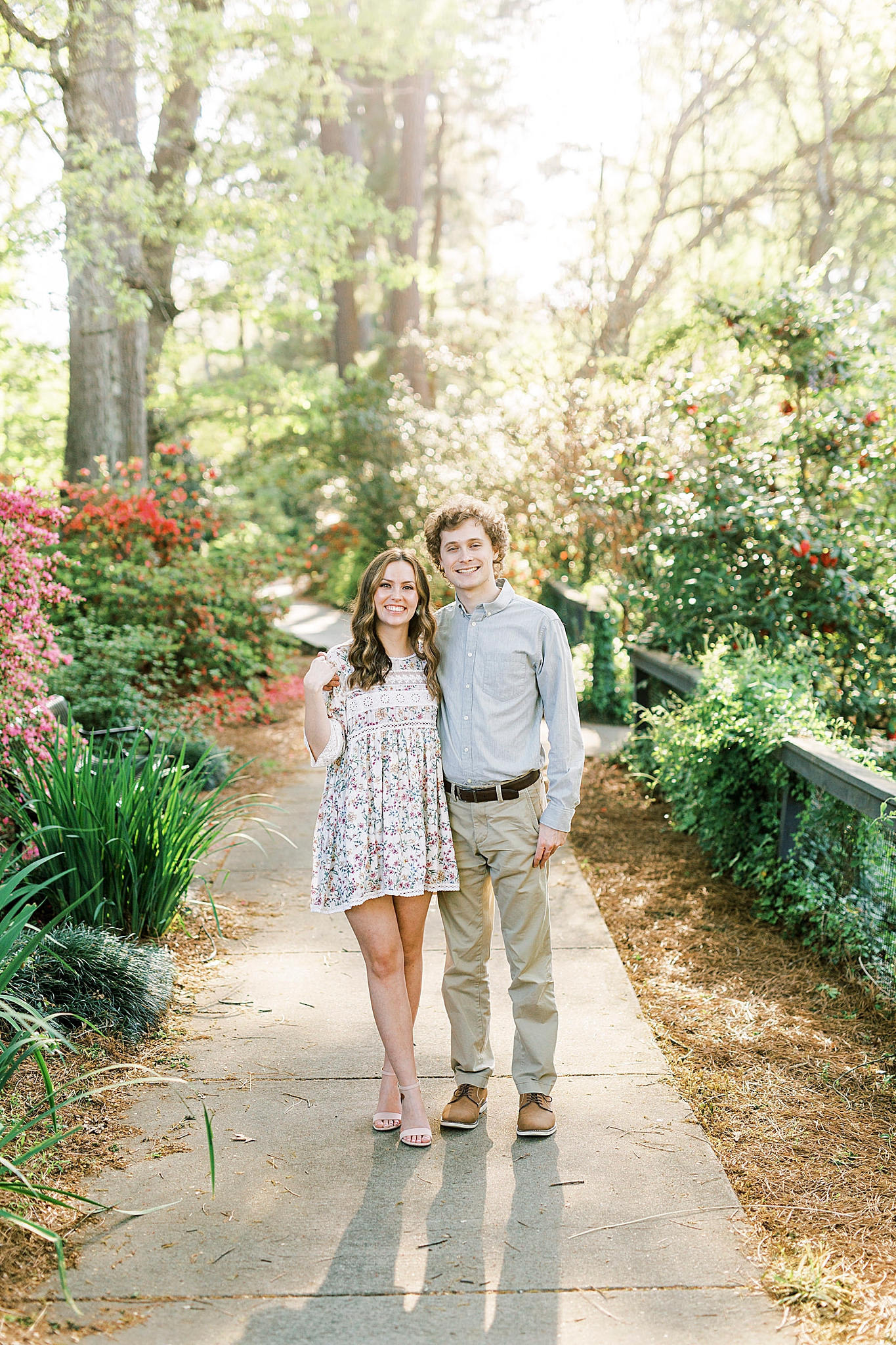 couple hugs on path in Rock Hill SC engagement photos
