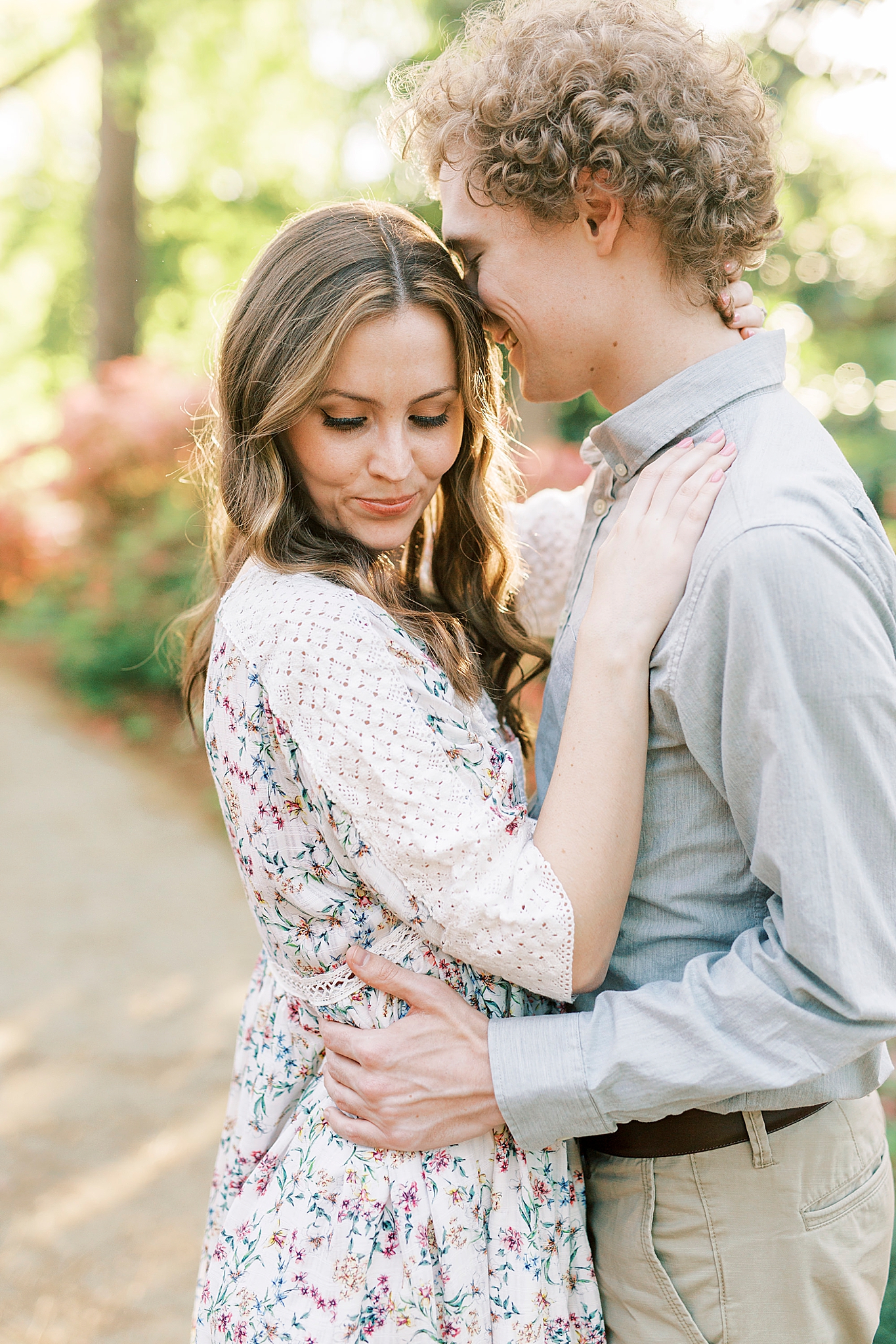 groom nuzzles bride's forehead during SC engagement photos