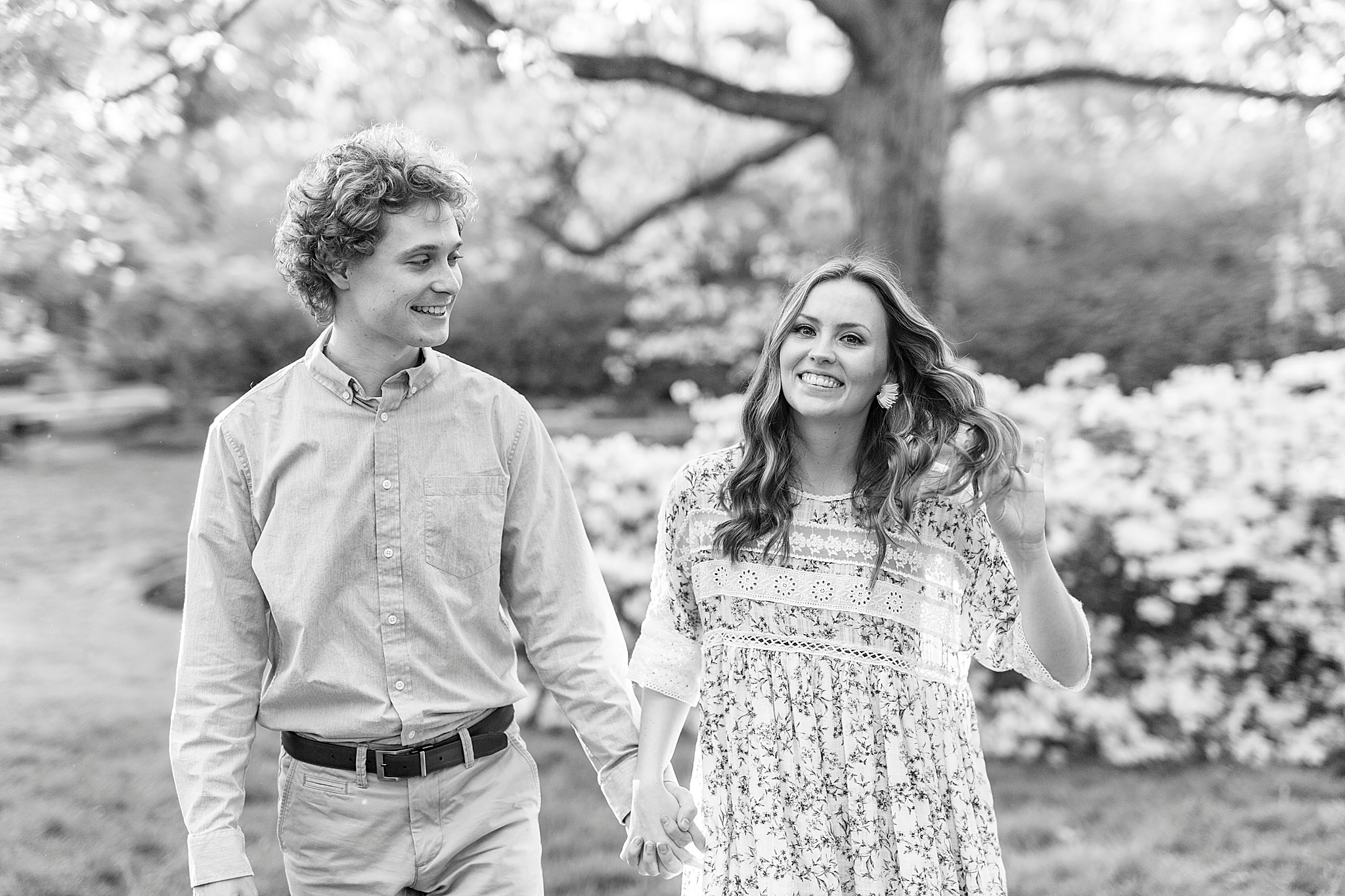 bride and groom walk through gardens in Rock Hill SC