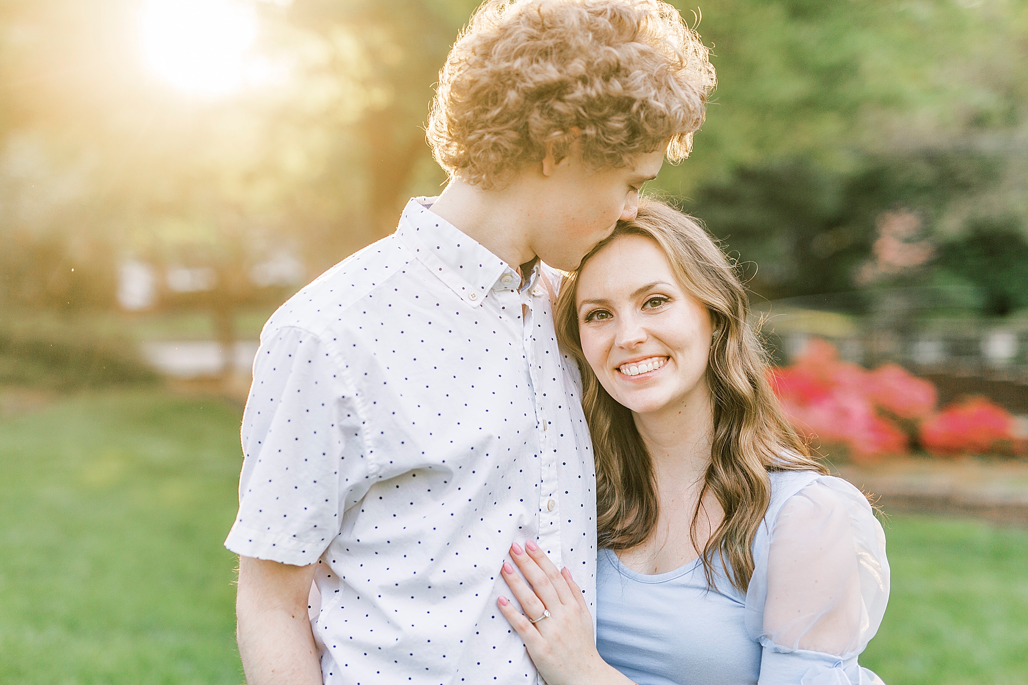groom leans down to bride's forehead during Glencairn Gardens engagement photos