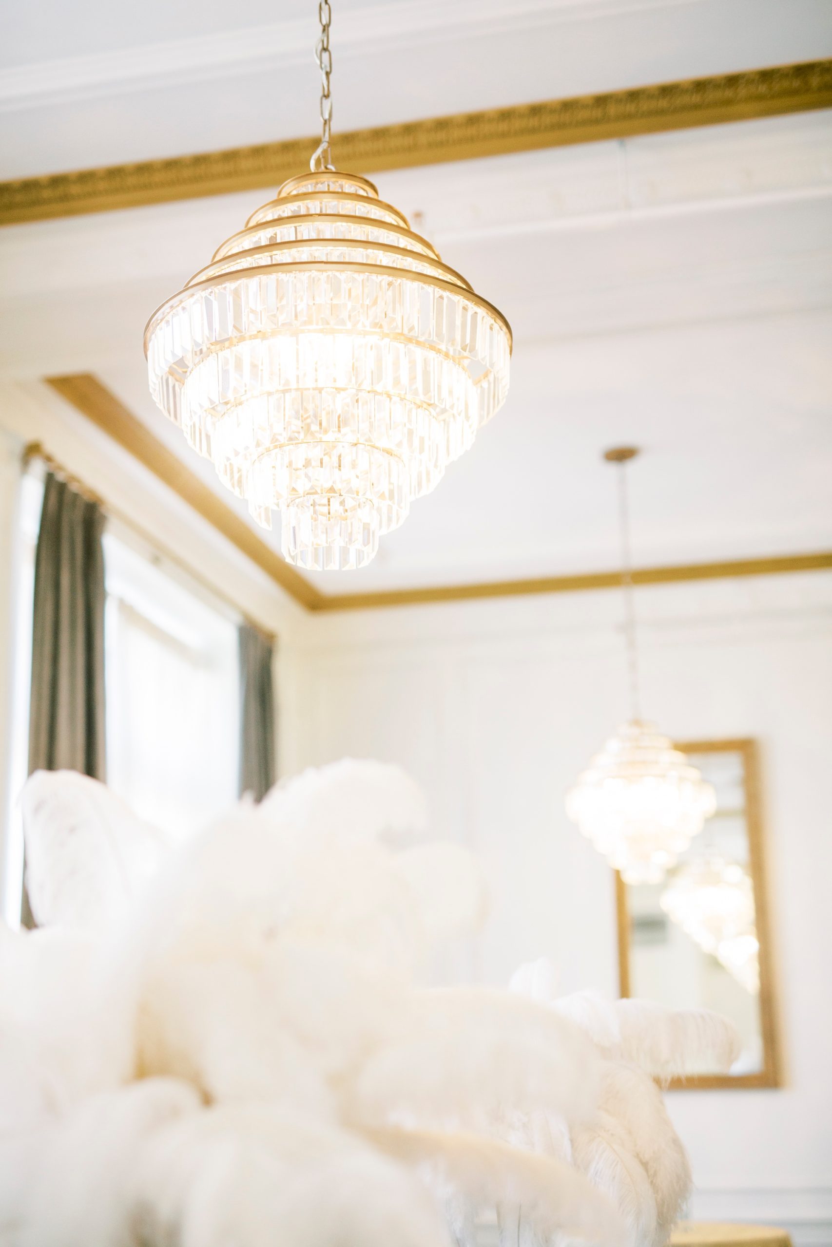 Hotel Concord chandelier above featured centerpieces