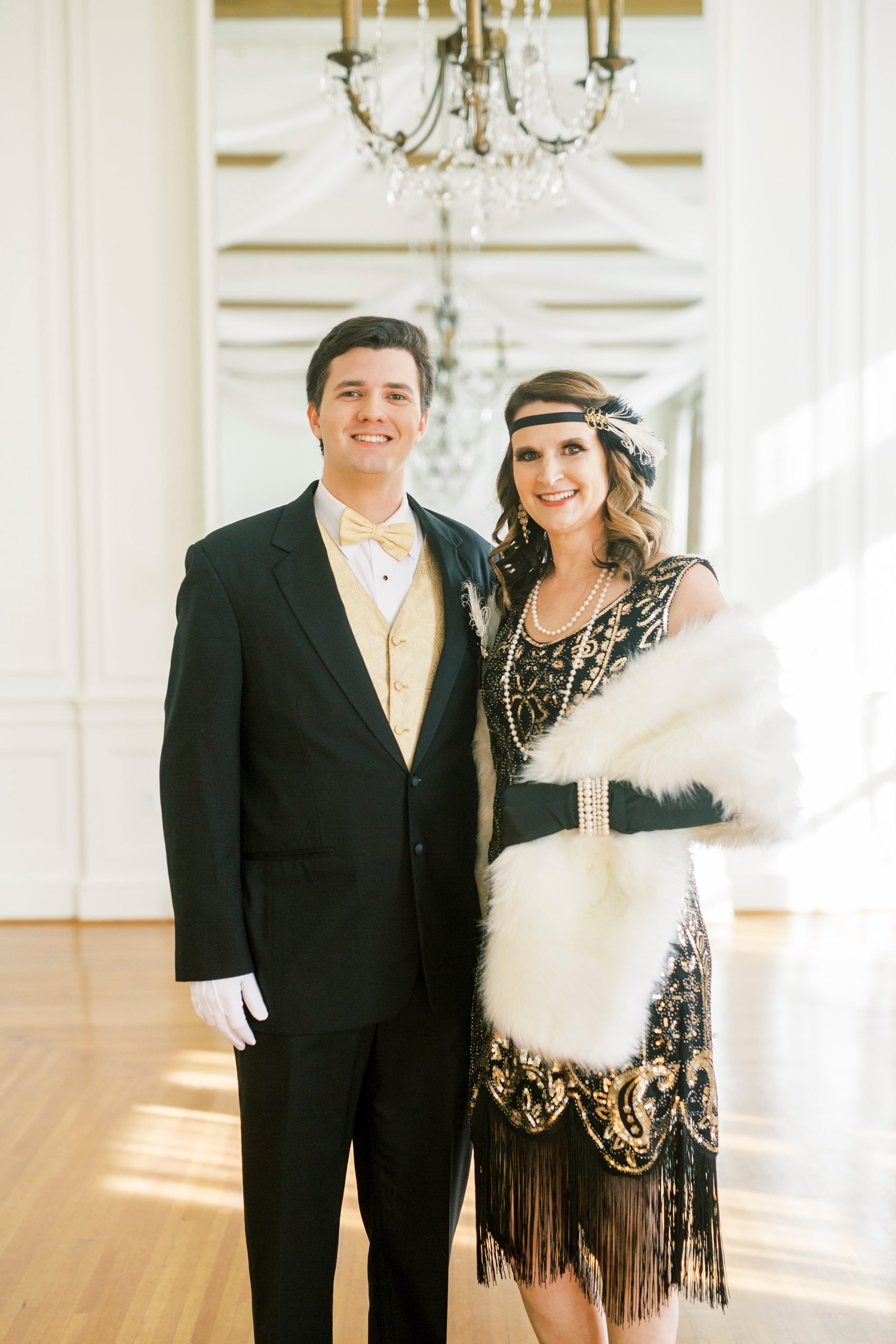 mom and son hug during 1920's themed birthday party at The Hotel Concord