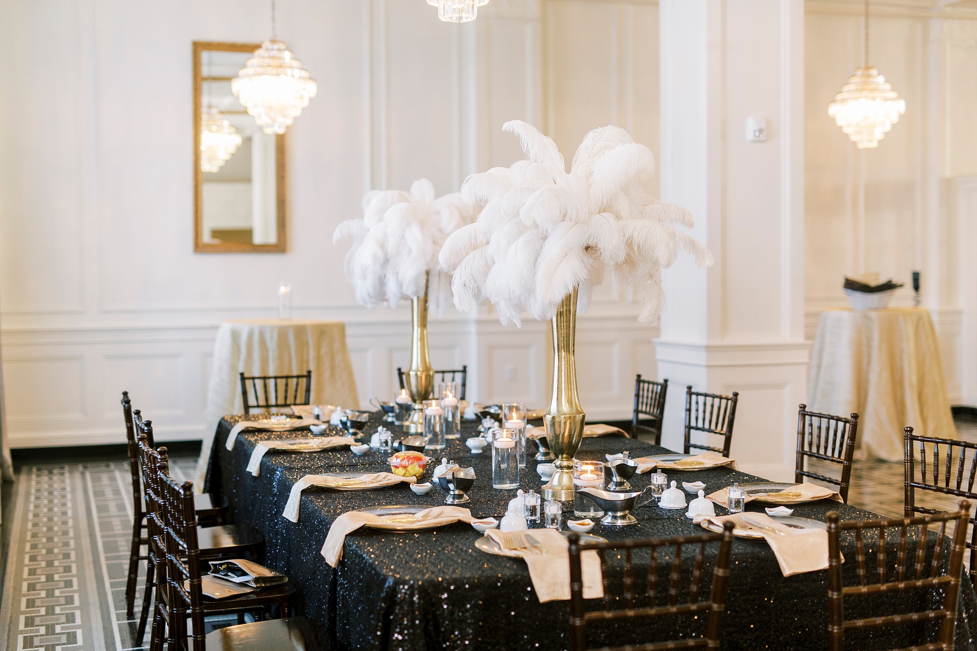 gold and black centerpieces for Great Gatsby birthday party