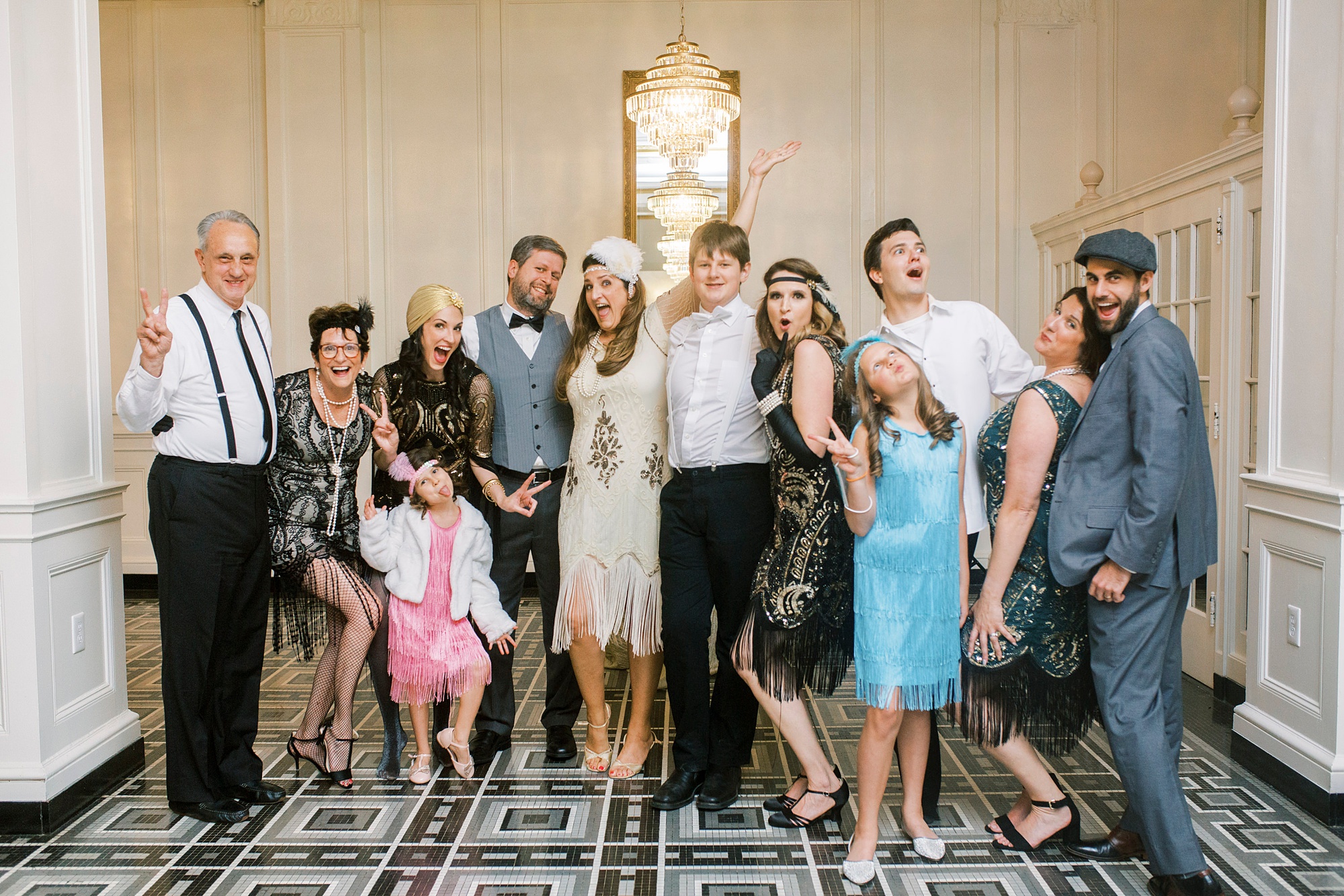 family poses together in The Hotel Concord after birthday party