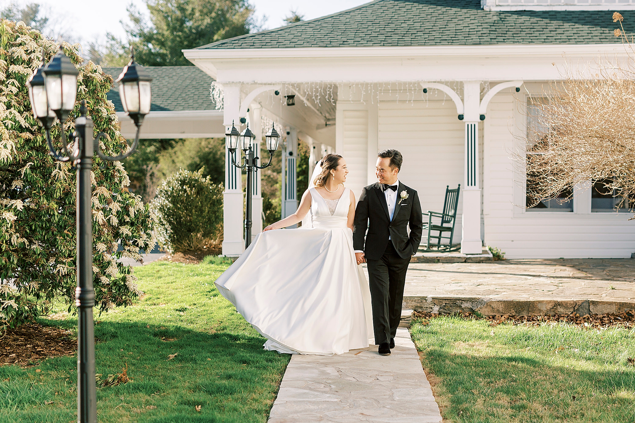 newlyweds walk outside Green Park Inn in Blowing Rock NC