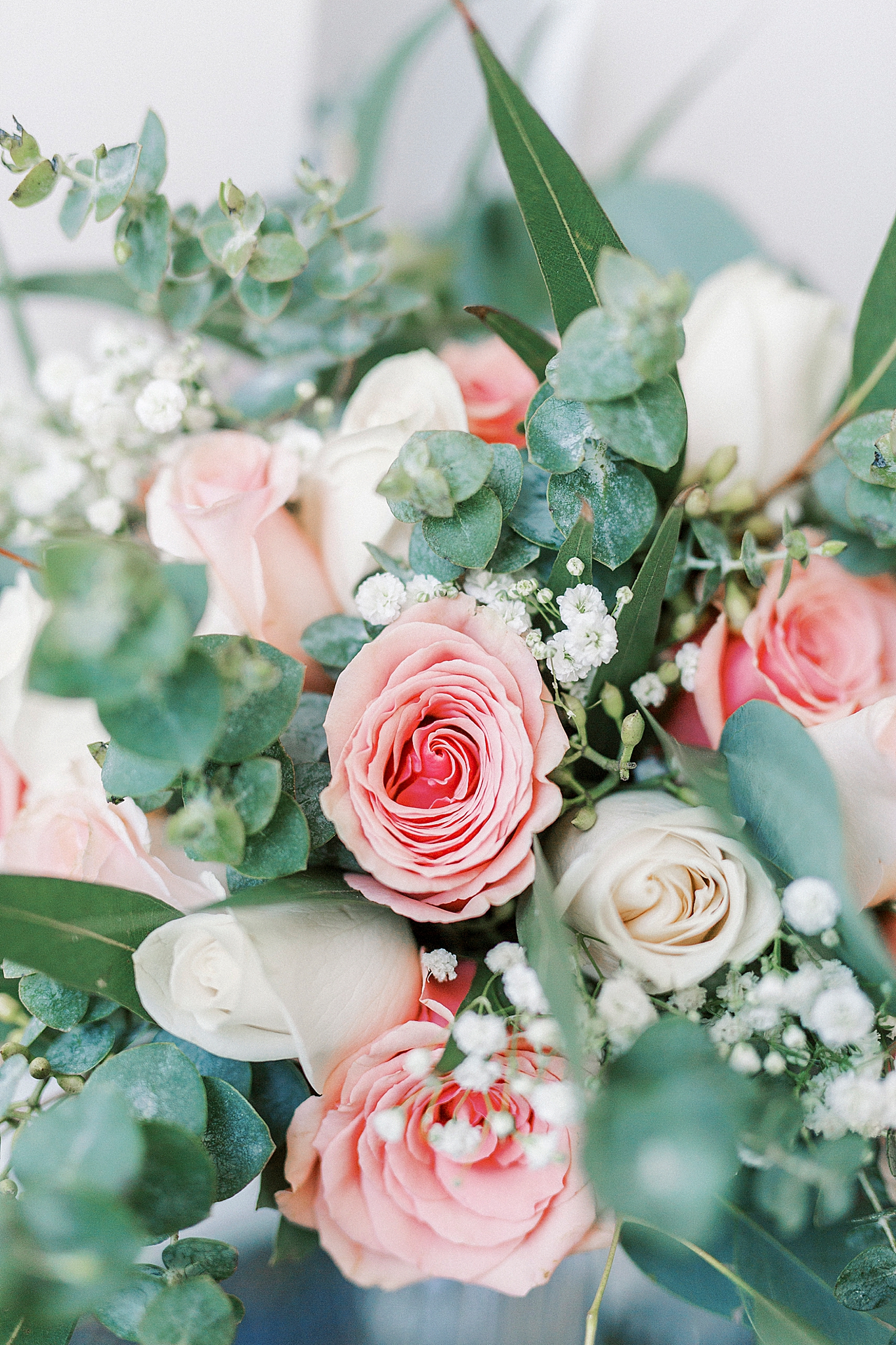 bride's pink and ivory bouquet for spring wedding